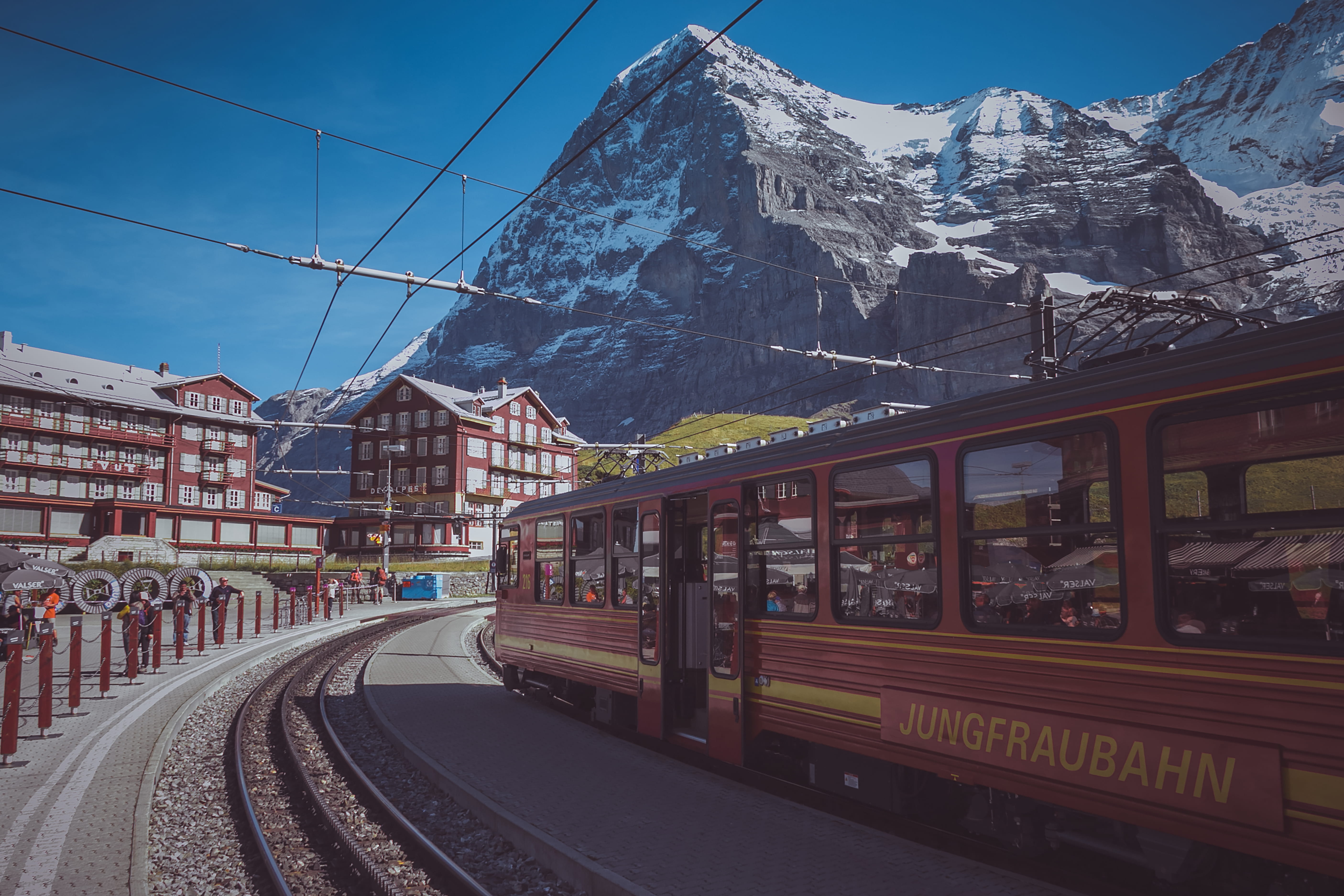 station, building exterior, track, train, outdoors, streetcar, mountain range, Swiss, cable car, winter, vehicle, train track, Street, tram, 5K, cold temperature, HD Wallpaper
