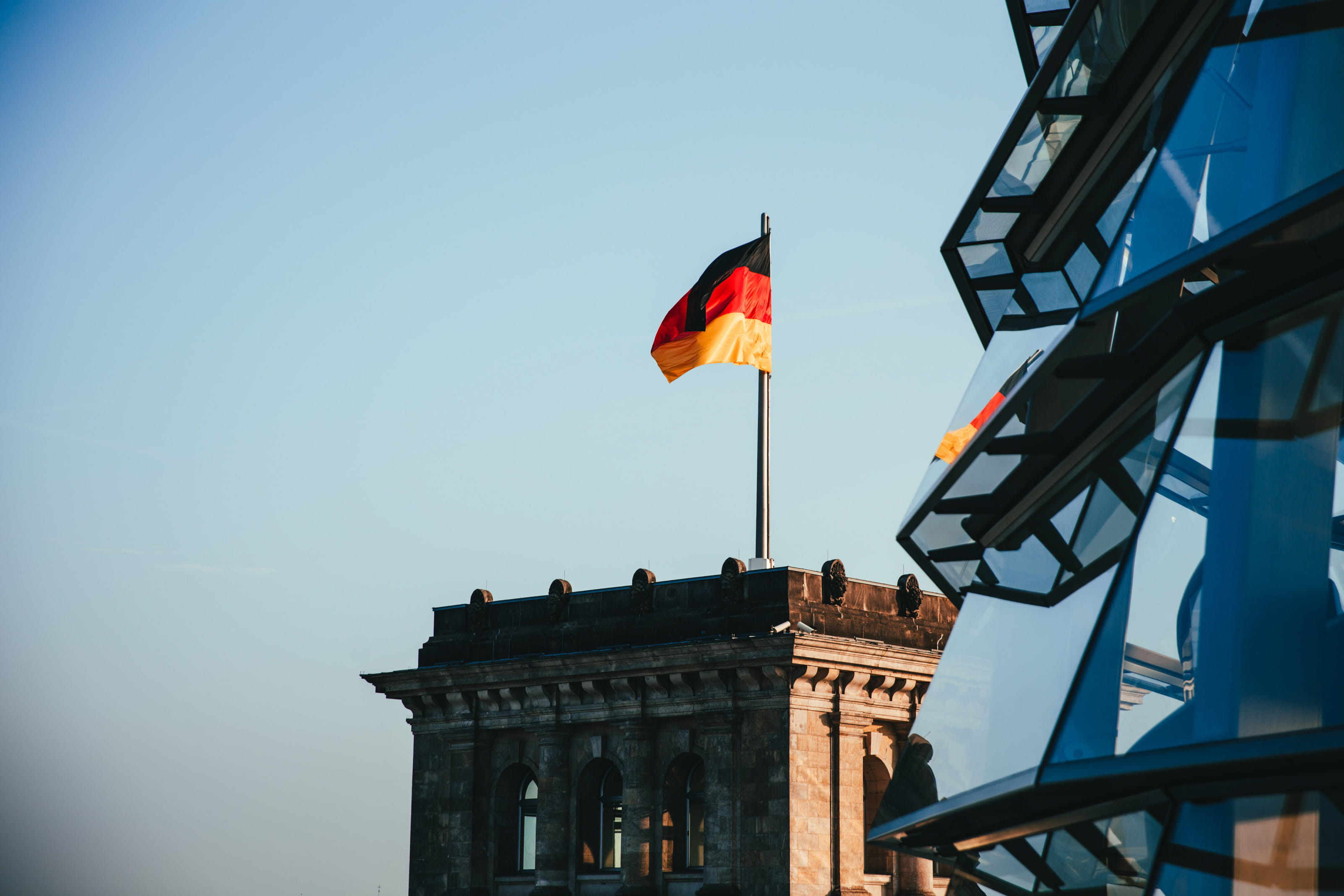 patriotism, sky, building, nation, blue, red, nature, national, low angle view, state, allegiance, wind, travel destinations, outdoors, europe, day, yellow, HD Wallpaper