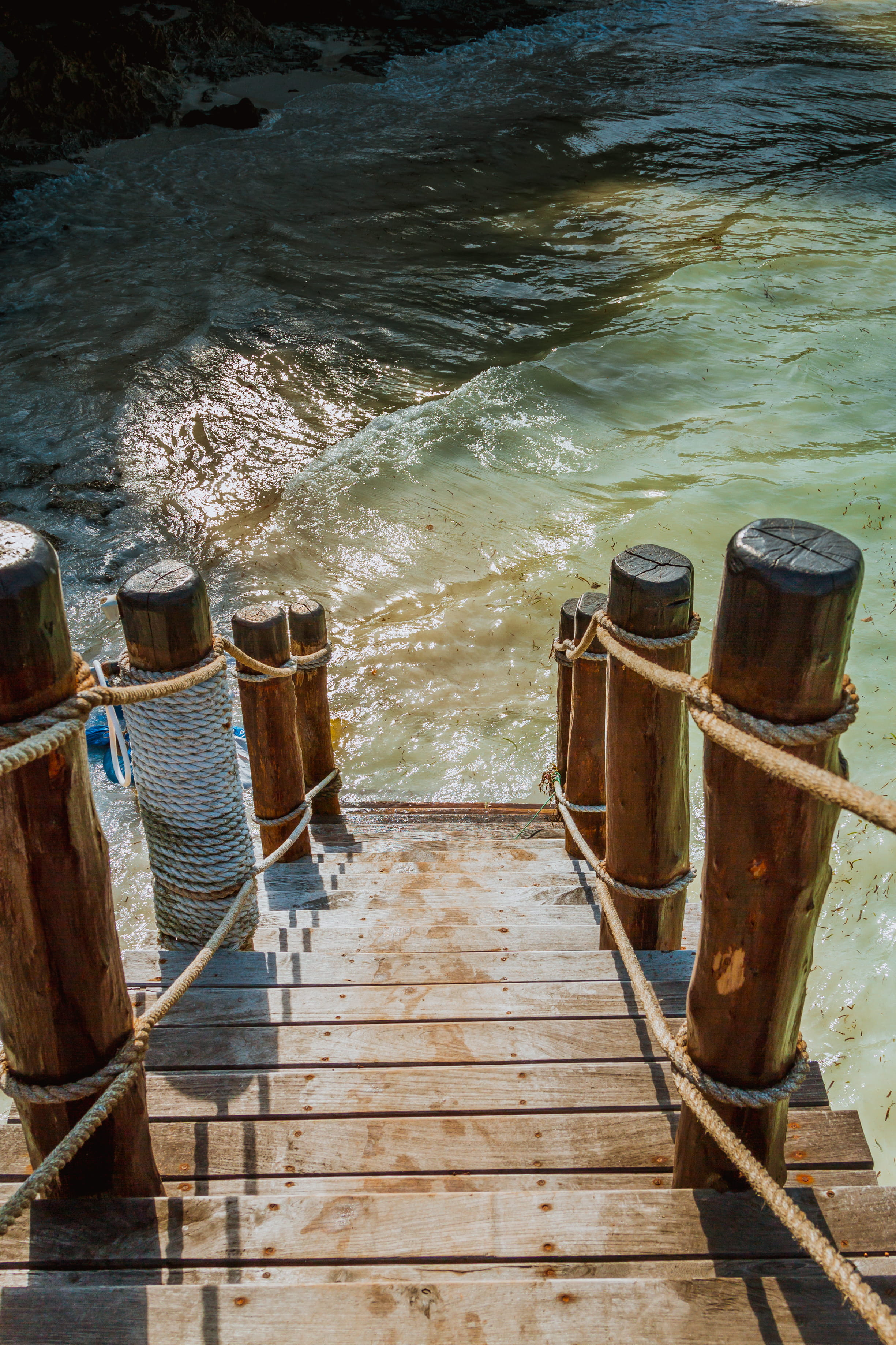 tranquility, zanzibar, abandoned, day, the way forward, 2K, flowing water, gateway, rope, wave, ropes, wood - material, power in nature, direction, no people, Phone HD Wallpaper