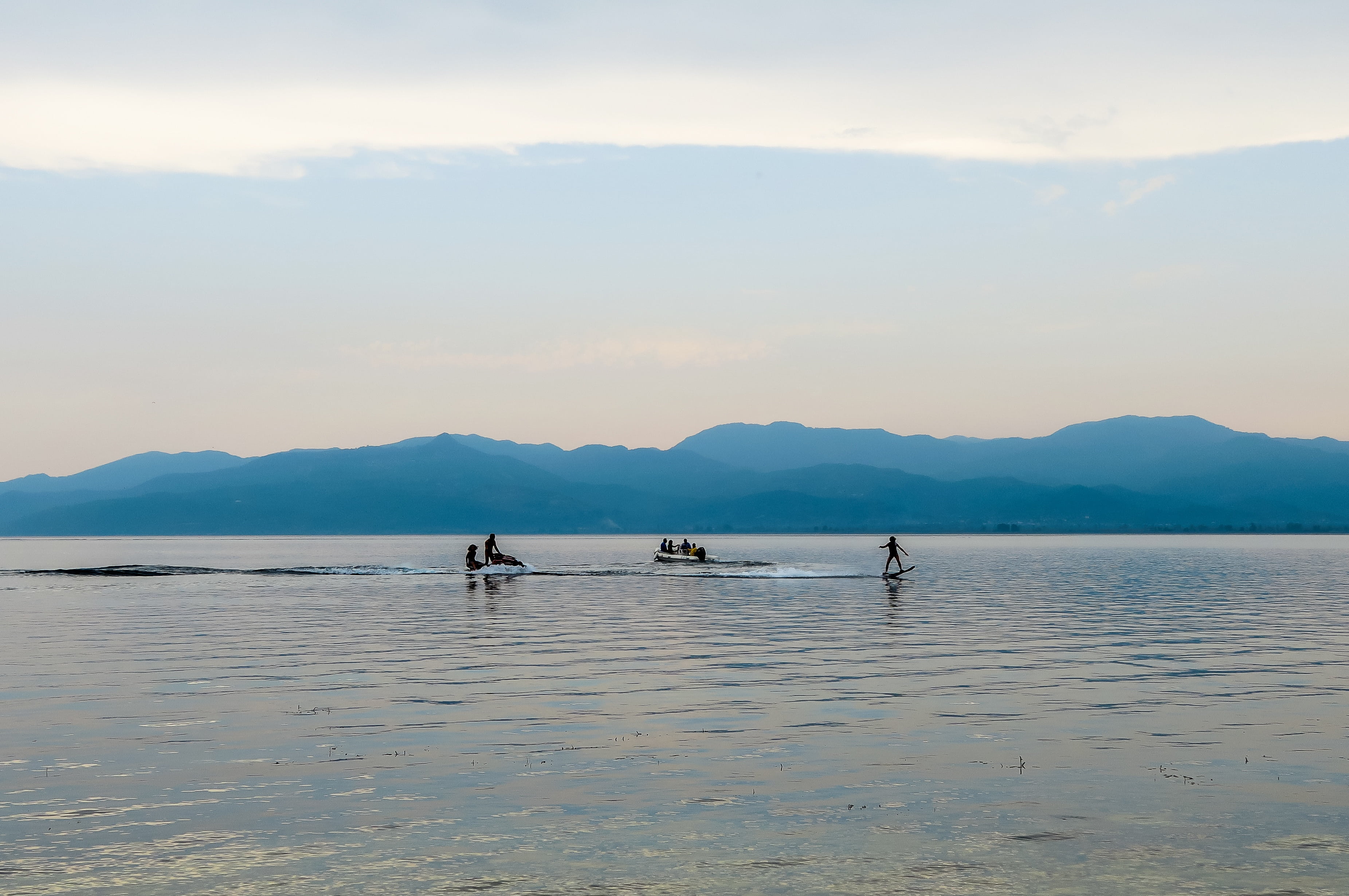 clouds, scenics, group, sky, tranquil scene, cloud - sky, lifestyles, tranquility, person, middle, blue, craft, men, sea, different, beauty in nature, surfboard, HD Wallpaper