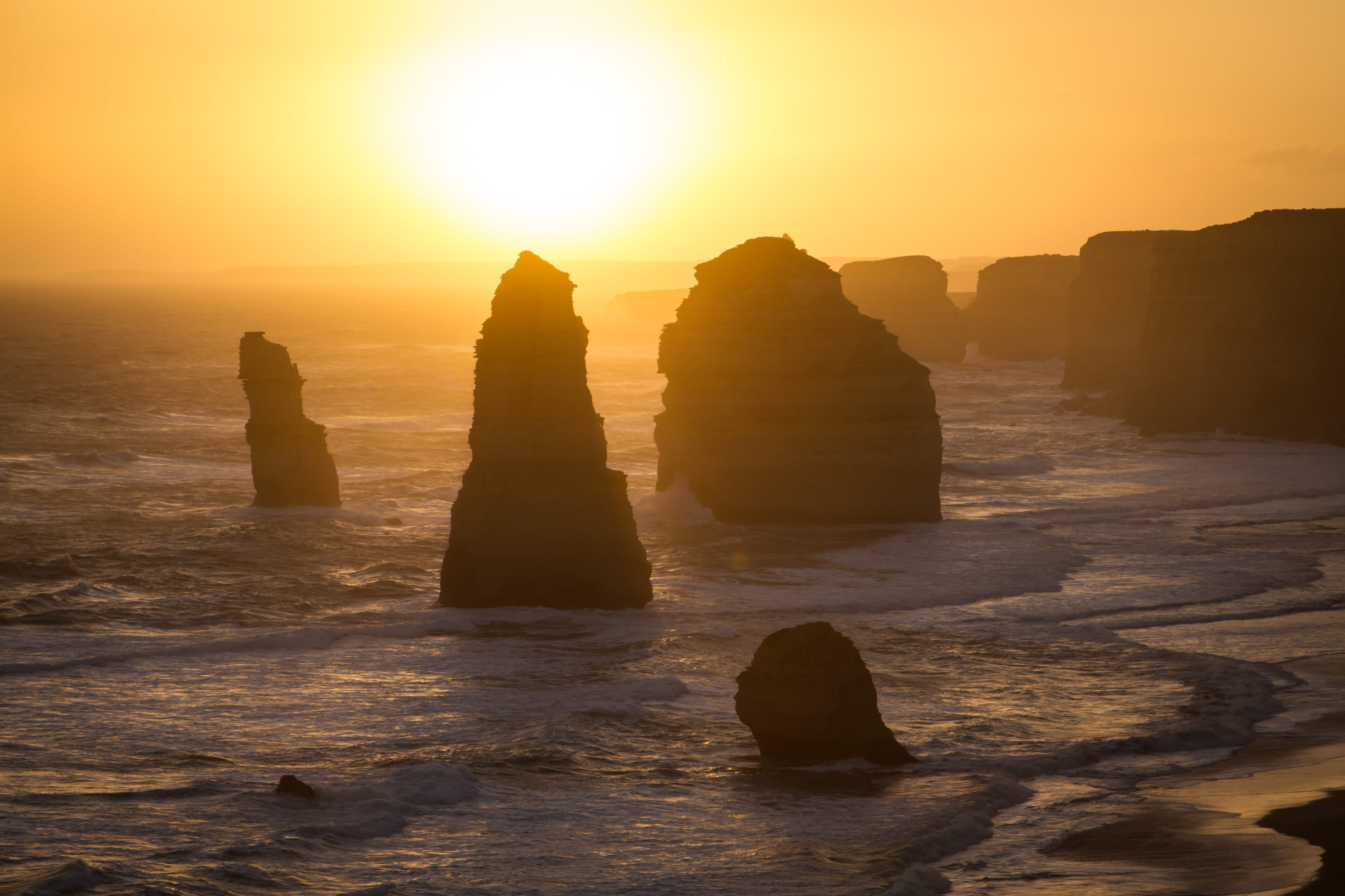 sky, tranquil scene, horizon over water, no people, nature, stack rock, twelve apostles, idyllic, beauty in nature, sun, sunset, coast walk, orange color, HD Wallpaper