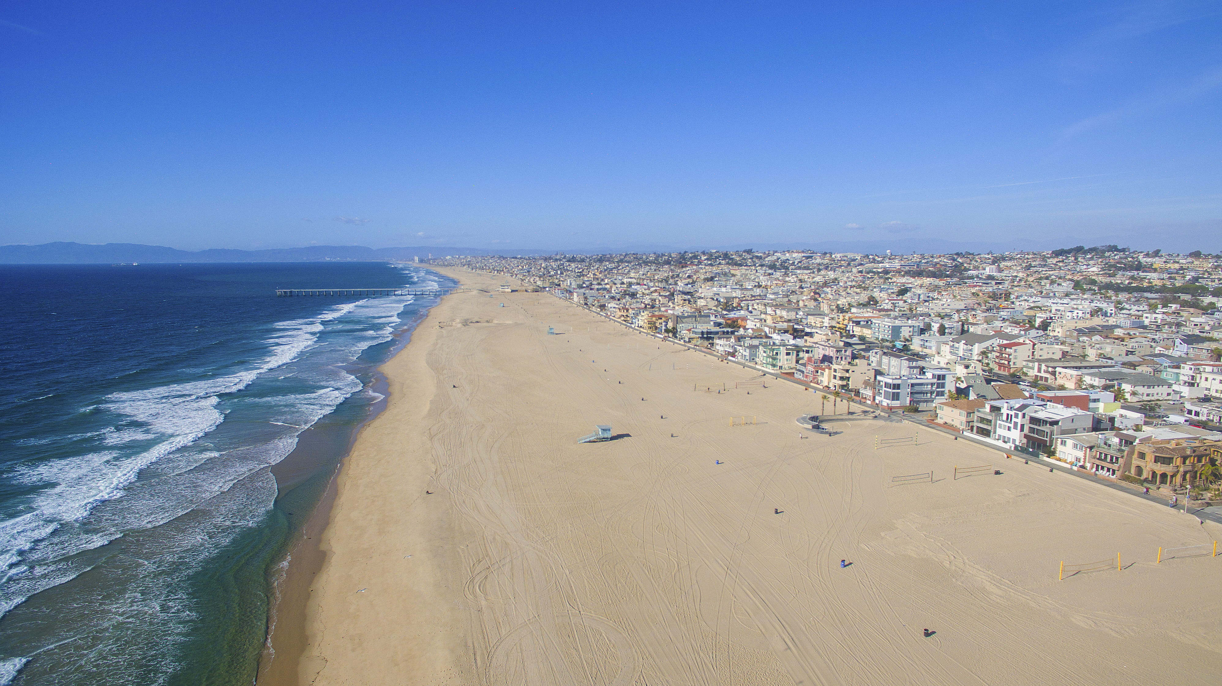 sea, brown, scenics - nature, motion, united states, blue, land, clear sky, building exterior, drone, beach, southern california, outdoors, sand, architecture, HD Wallpaper