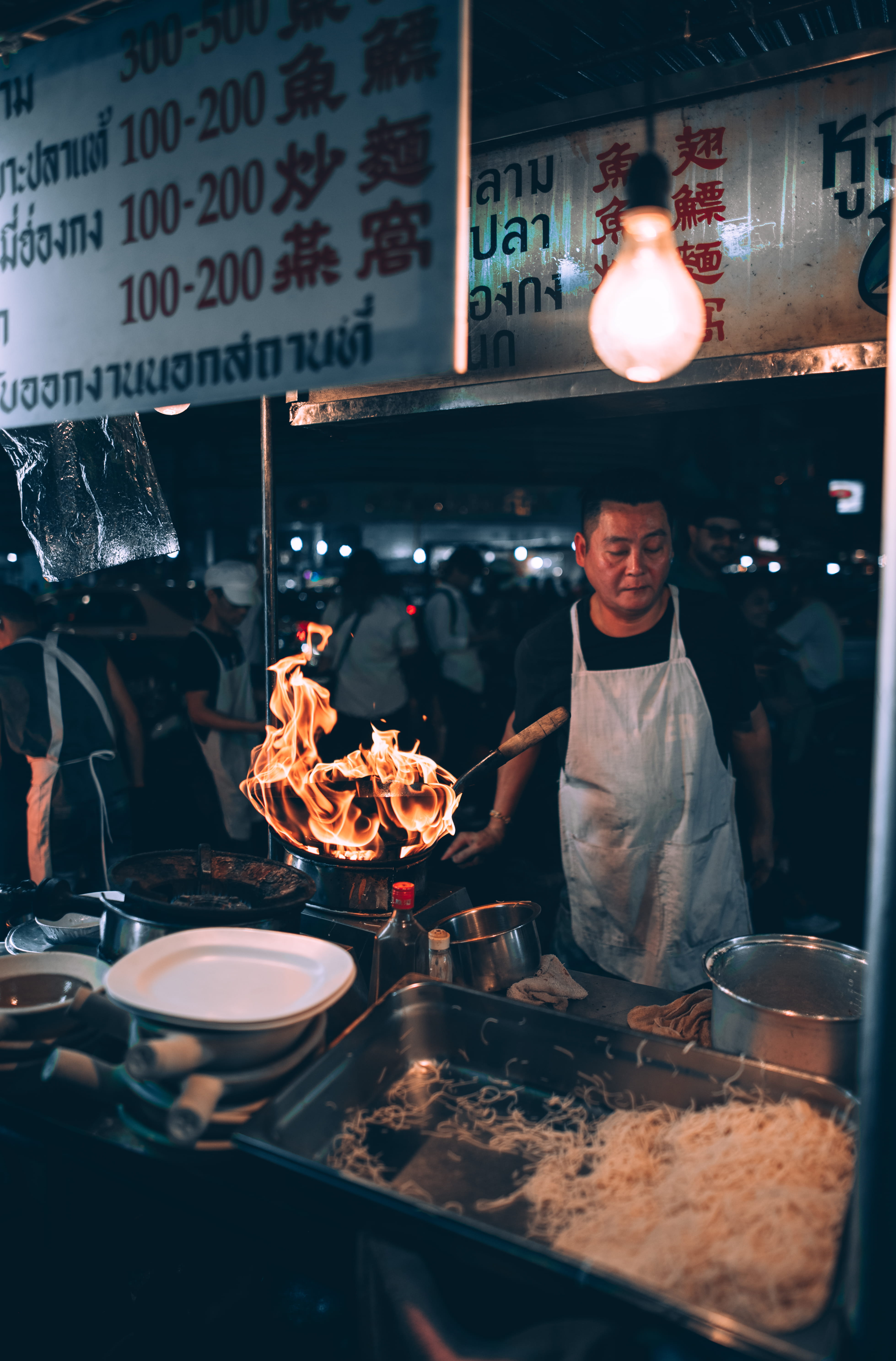 lighting, burning, 5K, fullframe, cooking, nightlife, standing, occupation, preparing food, front, nikon, fastmoving, working, preparation, text, men, Phone HD Wallpaper