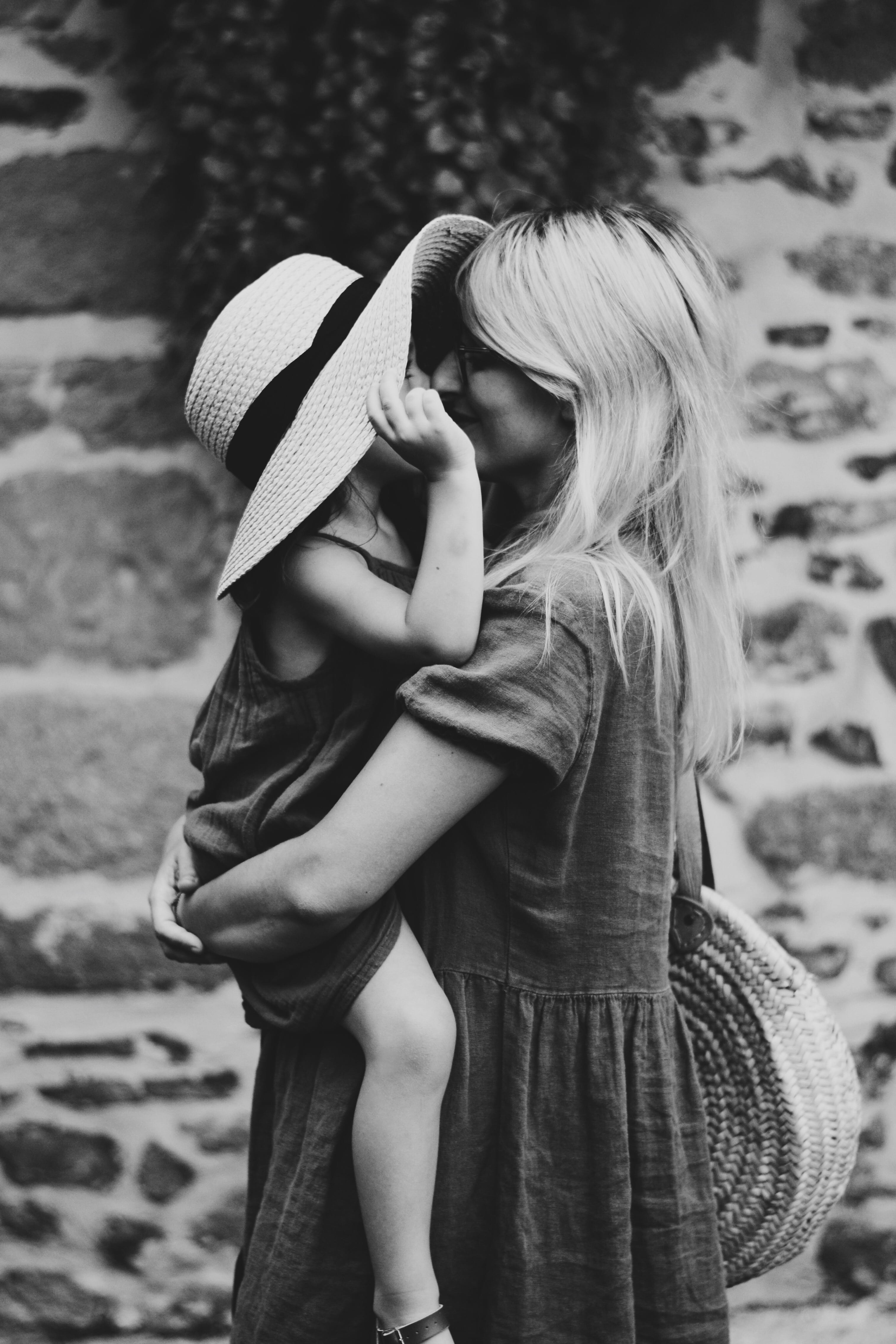 hat, standing, photography, bnw, moment, women, casual clothing, bonding, girl, happy, woman, hairstyle, maternal, black and white, love, portrait, carrying, Phone HD Wallpaper