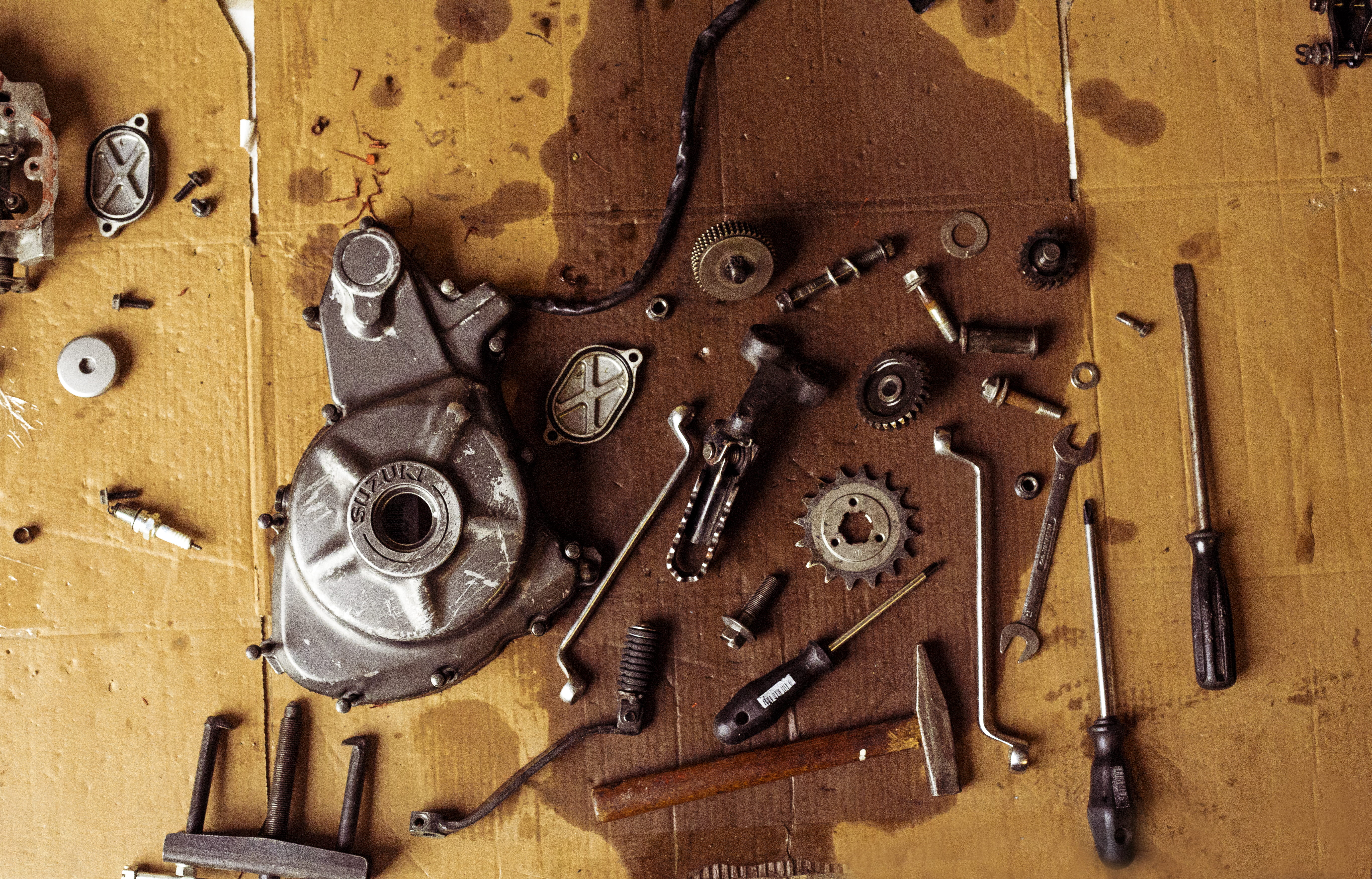 indoors, suzuki, motorcycle, hand tool, choice, nail, no people, work tool, hand saw, mechanictools, old, large group of objects, workshop, directly above, HD Wallpaper