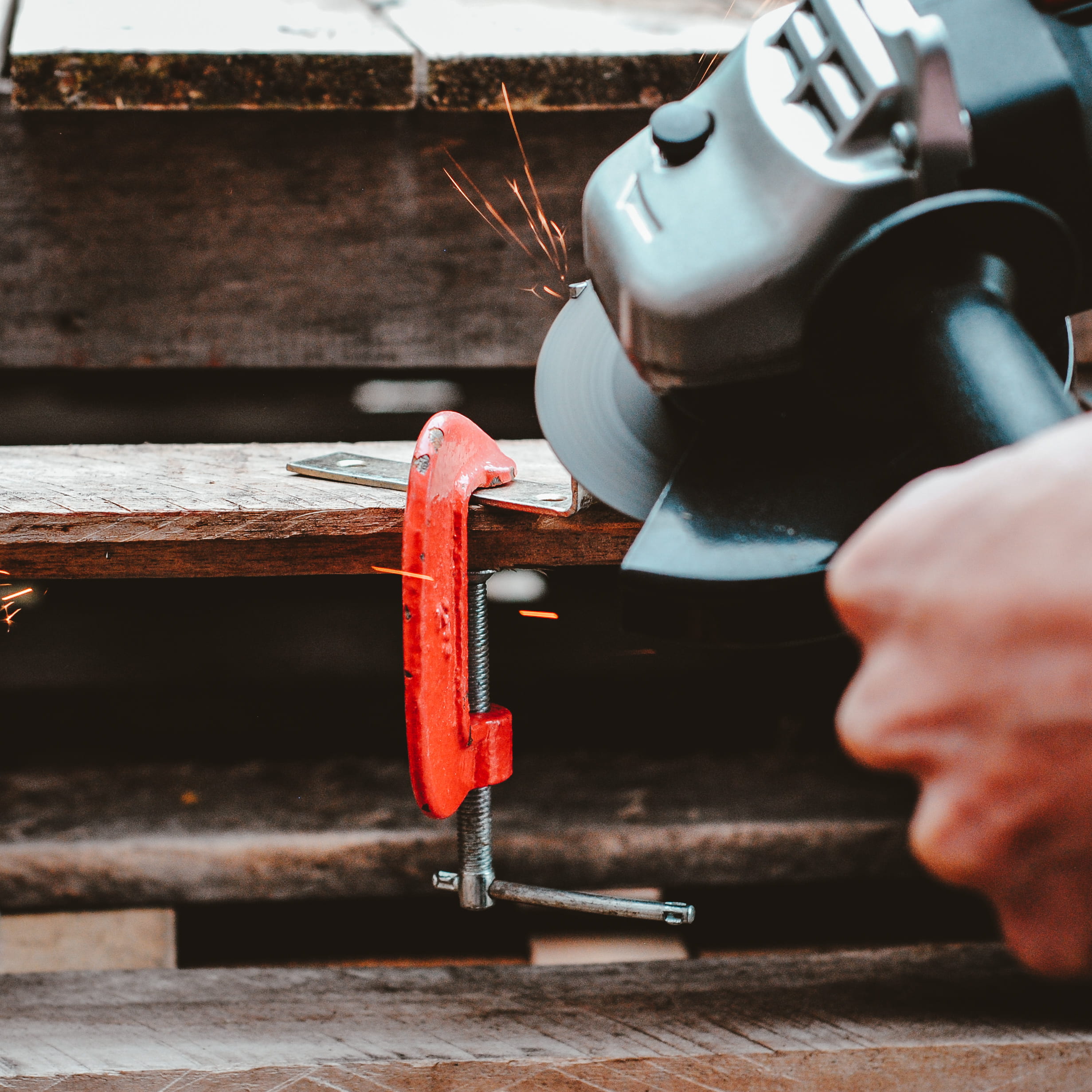 rotation, tech, holding, human body part, work, unrecognizable person, spark, indoors, silver, wood, 1080P, c, creative, technology, grind, hand, selective focus, Phone HD Wallpaper