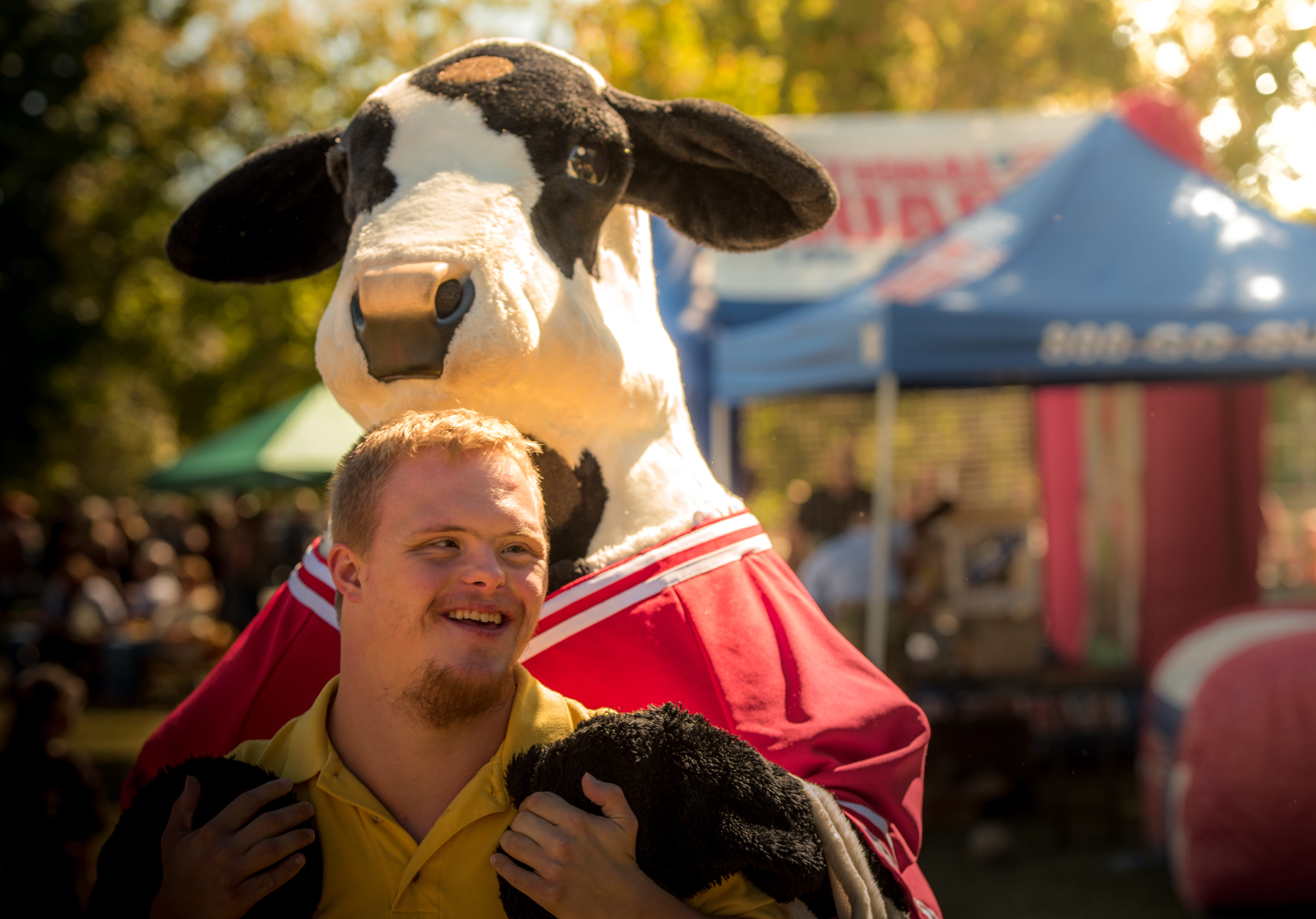 mammal, men, downs, laugh, maskot, representation, people, fun, 5K, waist up, focus on foreground, sun, yellow, knoxville, domestic animals, incidental people, HD Wallpaper