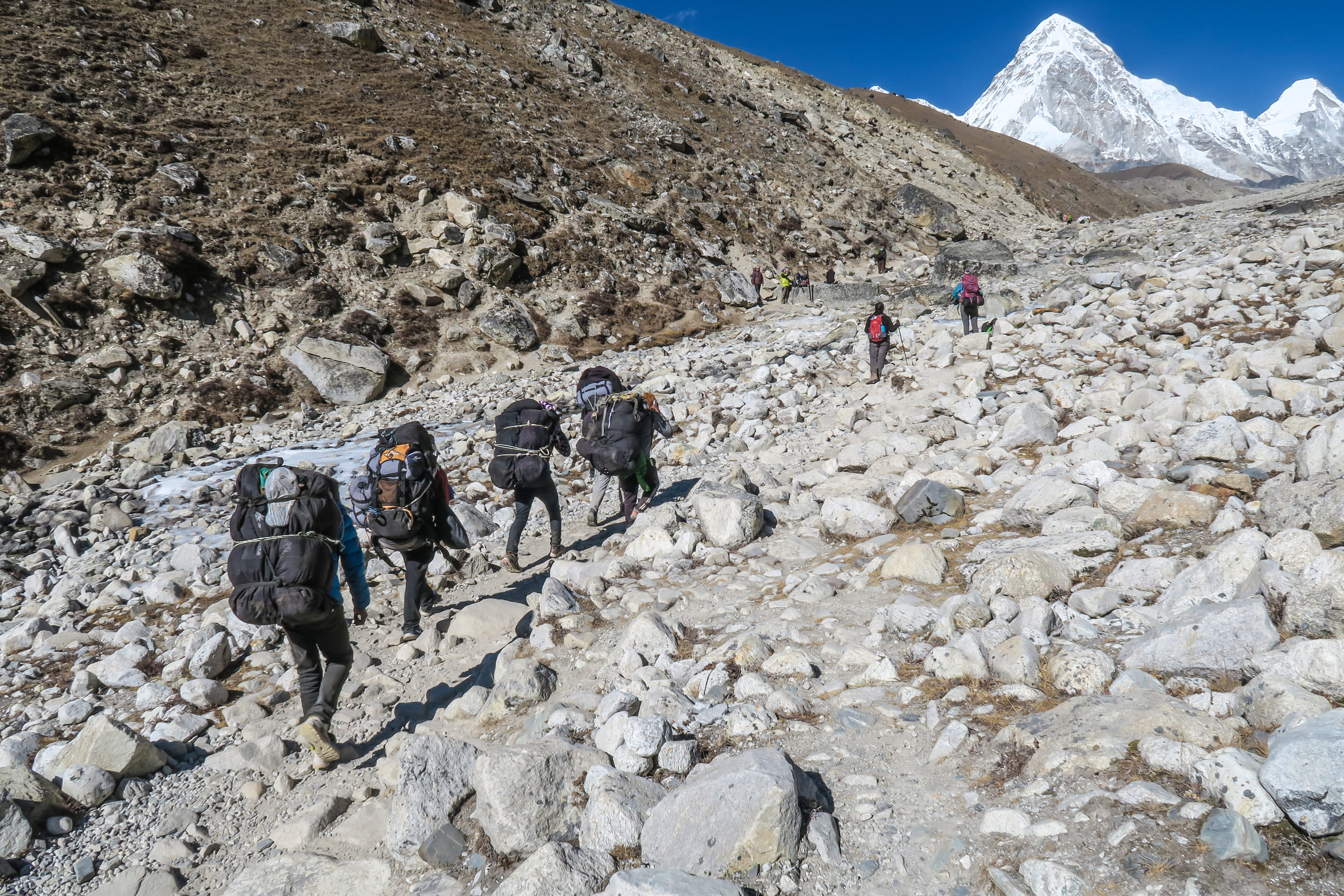 himalayas, walking, ground, gravel, road, solid, outdoors, mountain, apparel, clothing, leisure activity, real people, beauty in nature, bag, soil, carrying, HD Wallpaper