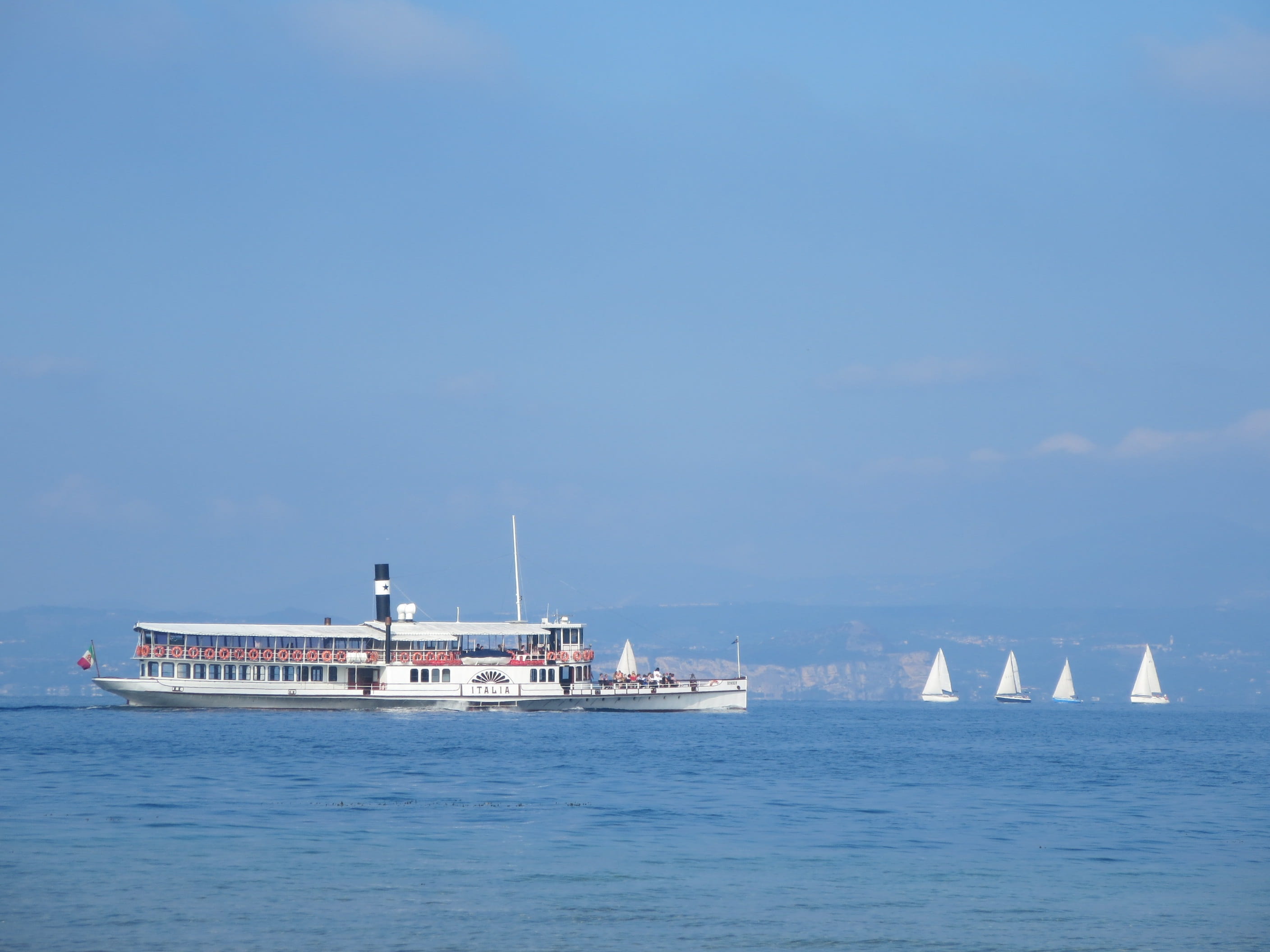 sailboat, blue, travel, built structure, copy space, 2K, nature, clear sky, garda, nautical vessel, paddle steamers, sea, Ship, no people, passenger craft, HD Wallpaper