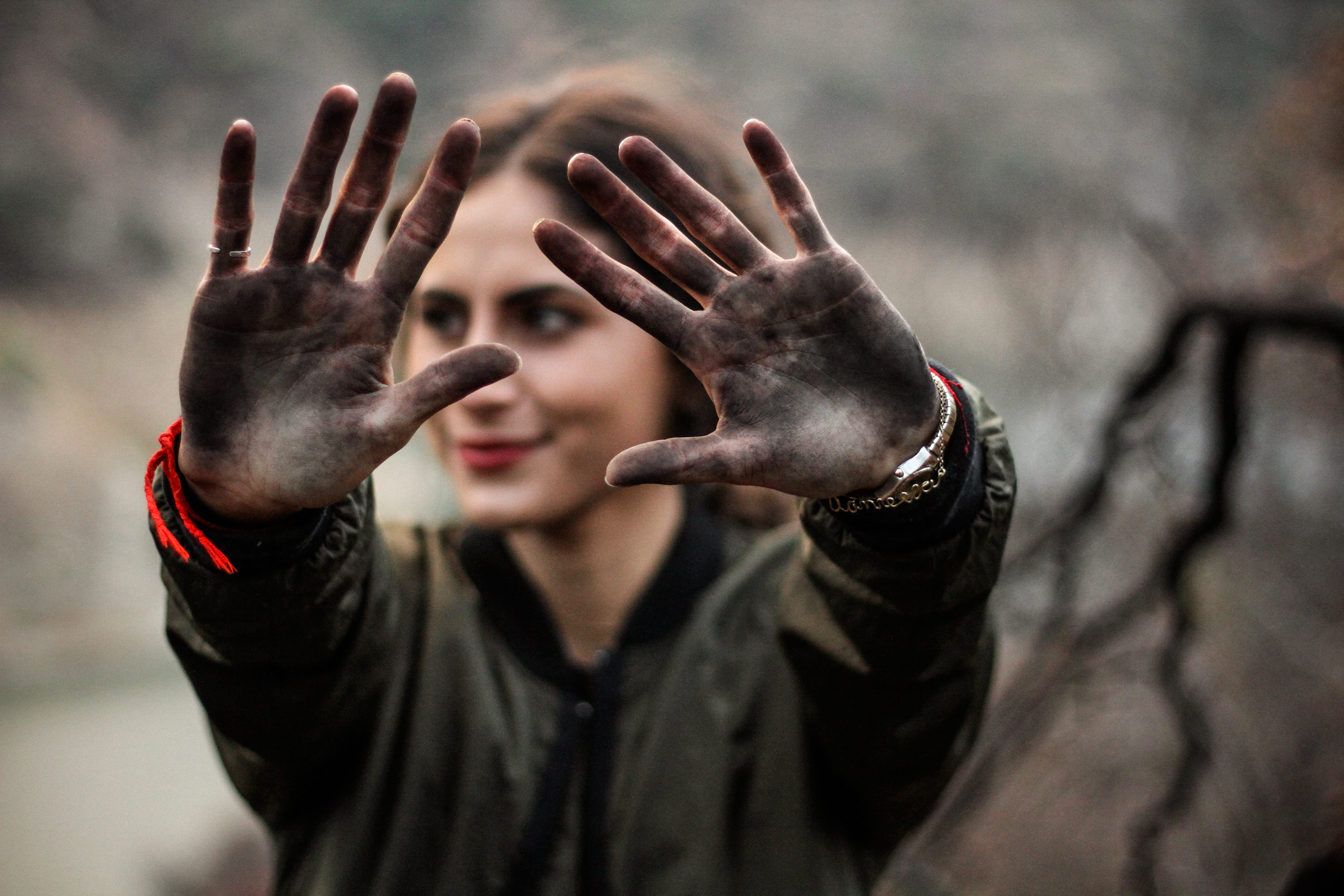 coat, black, smile, woman, body part, stop gesture, hands up, human body part, black color, women, bokeh, sadness, human hand, emotion, young adult, body, HD Wallpaper