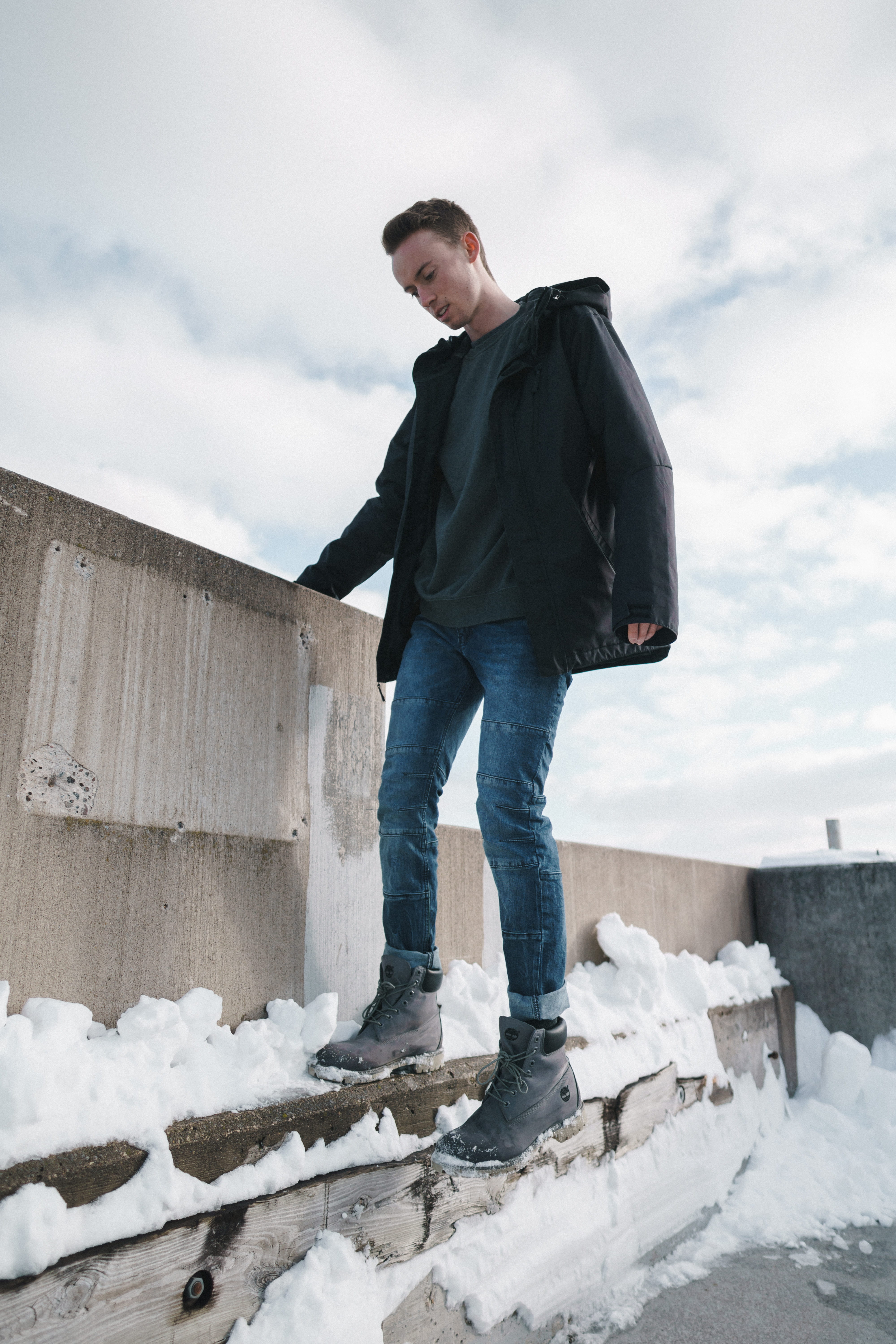 young adult, teenager, one person, wearing, portrait, standing, jacket, winter, full length, males, cloud - sky, building, casual clothing, young men, brown, Phone HD Wallpaper