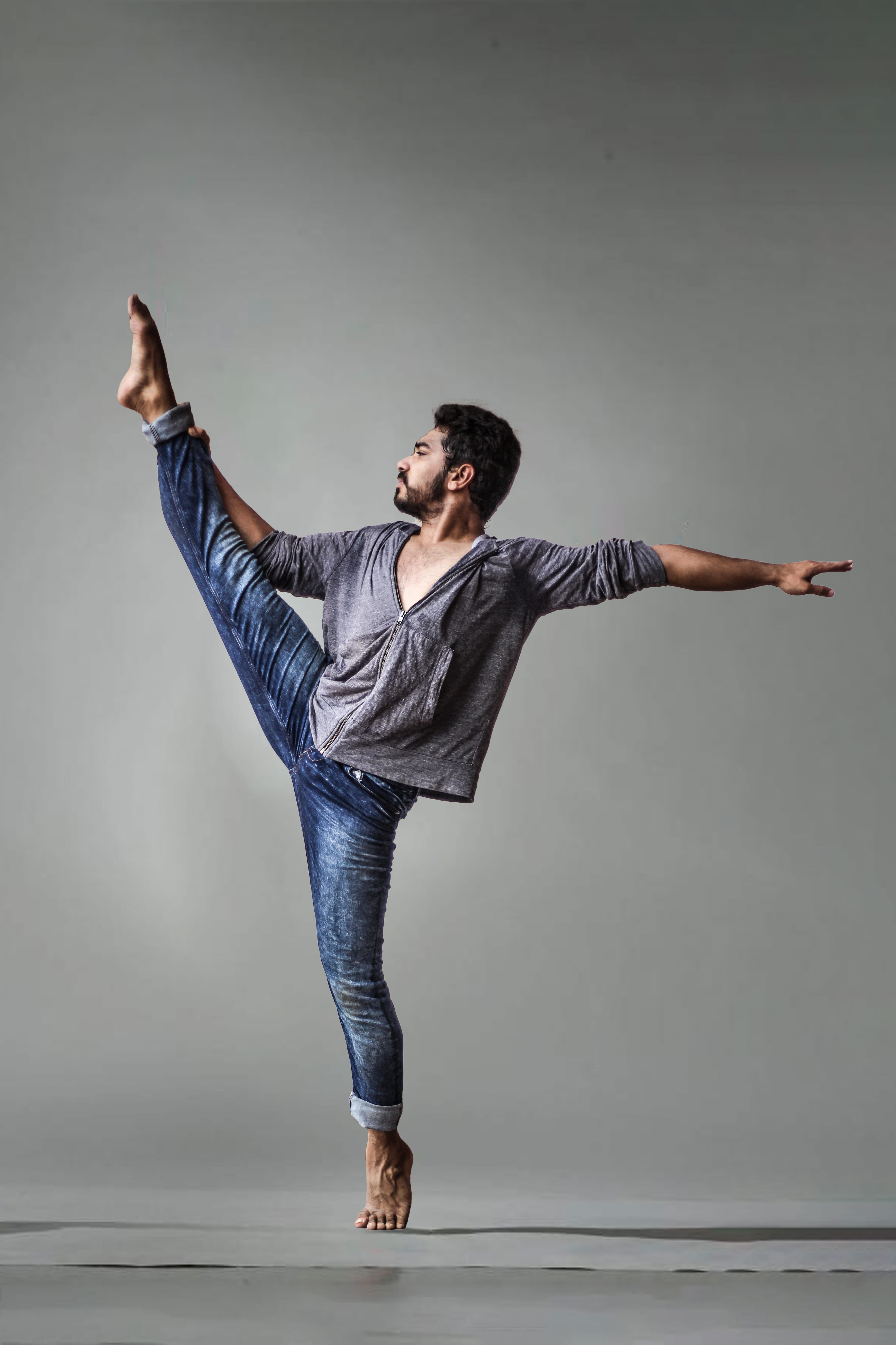 young, young men, person, human arm, studio, man, casual clothing, male, arms raised, one person, flexible, fashionable, performer, landscape, happiness, Phone HD Wallpaper