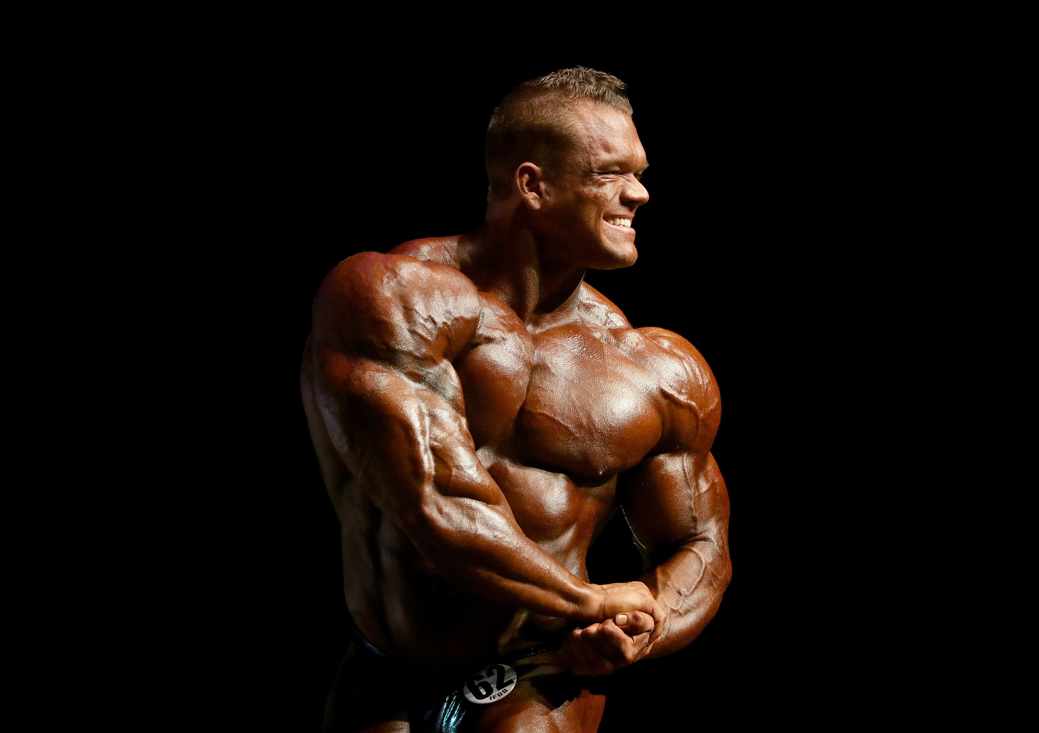 Dallas McCarver, biceps, muscle, pose, background black, hairstyle, bodybuilder, 4K, bodybuilding, HD Wallpaper
