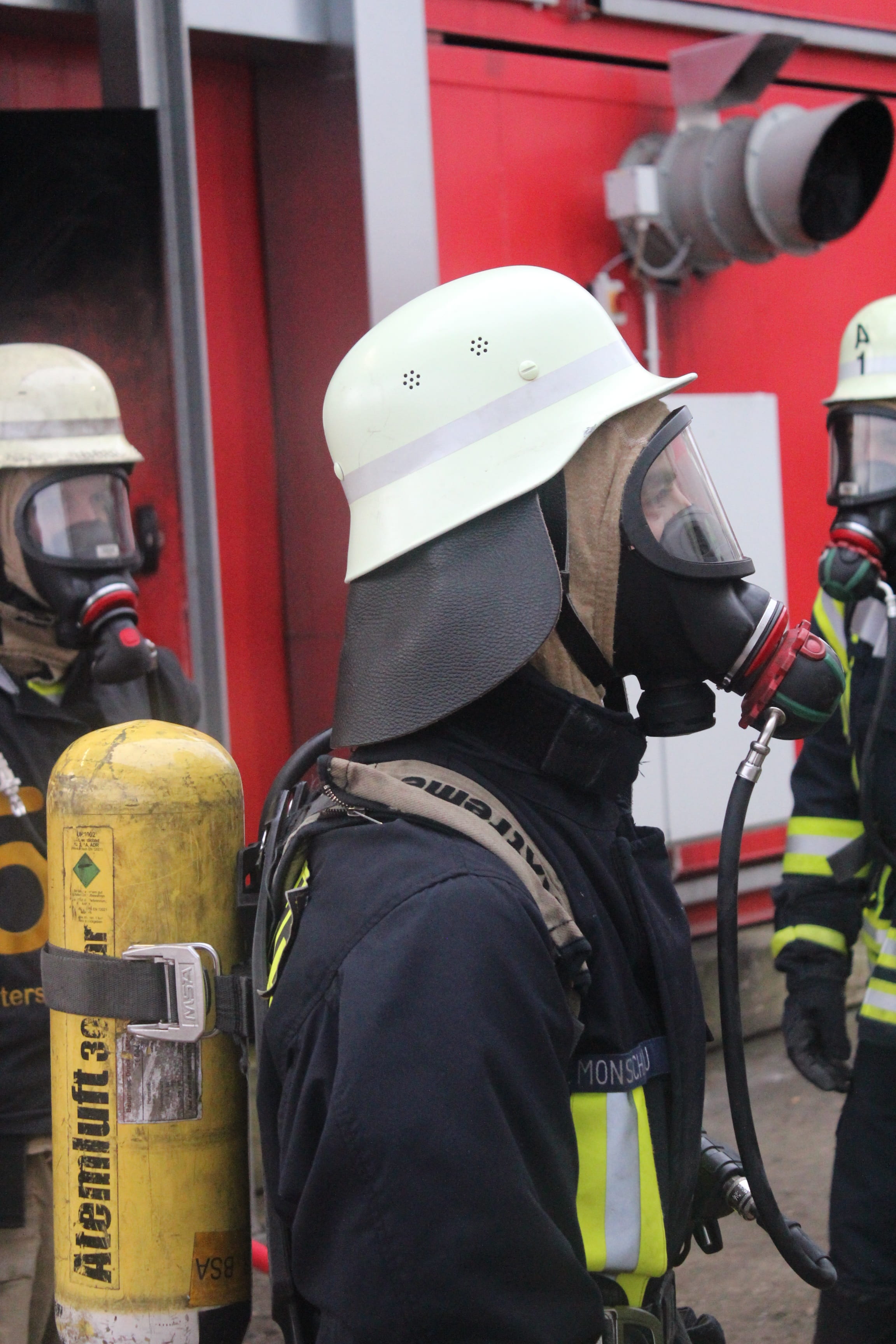 men, gas mask, breathing apparatus, day, headwear, use, rescue, fire hose, respiratory protection, fire, unrecognizable person, fire fighting, standing, Phone HD Wallpaper