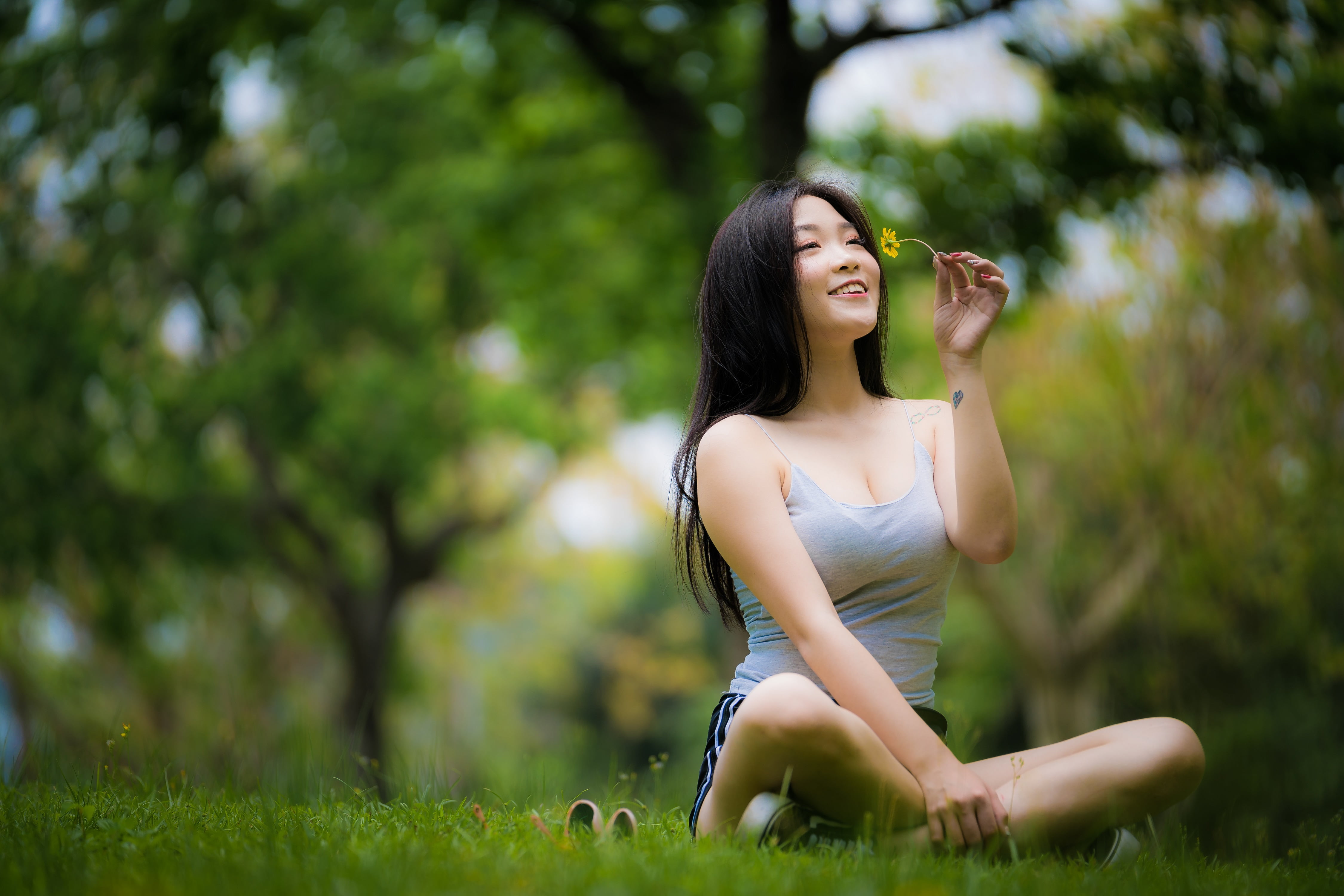 Asian, emotion, legs crossed, model, tank top, green color, hair, outdoors, sunglasses, young women, sitting, young adult, nature, adult, tree, grass, smiling, HD Wallpaper