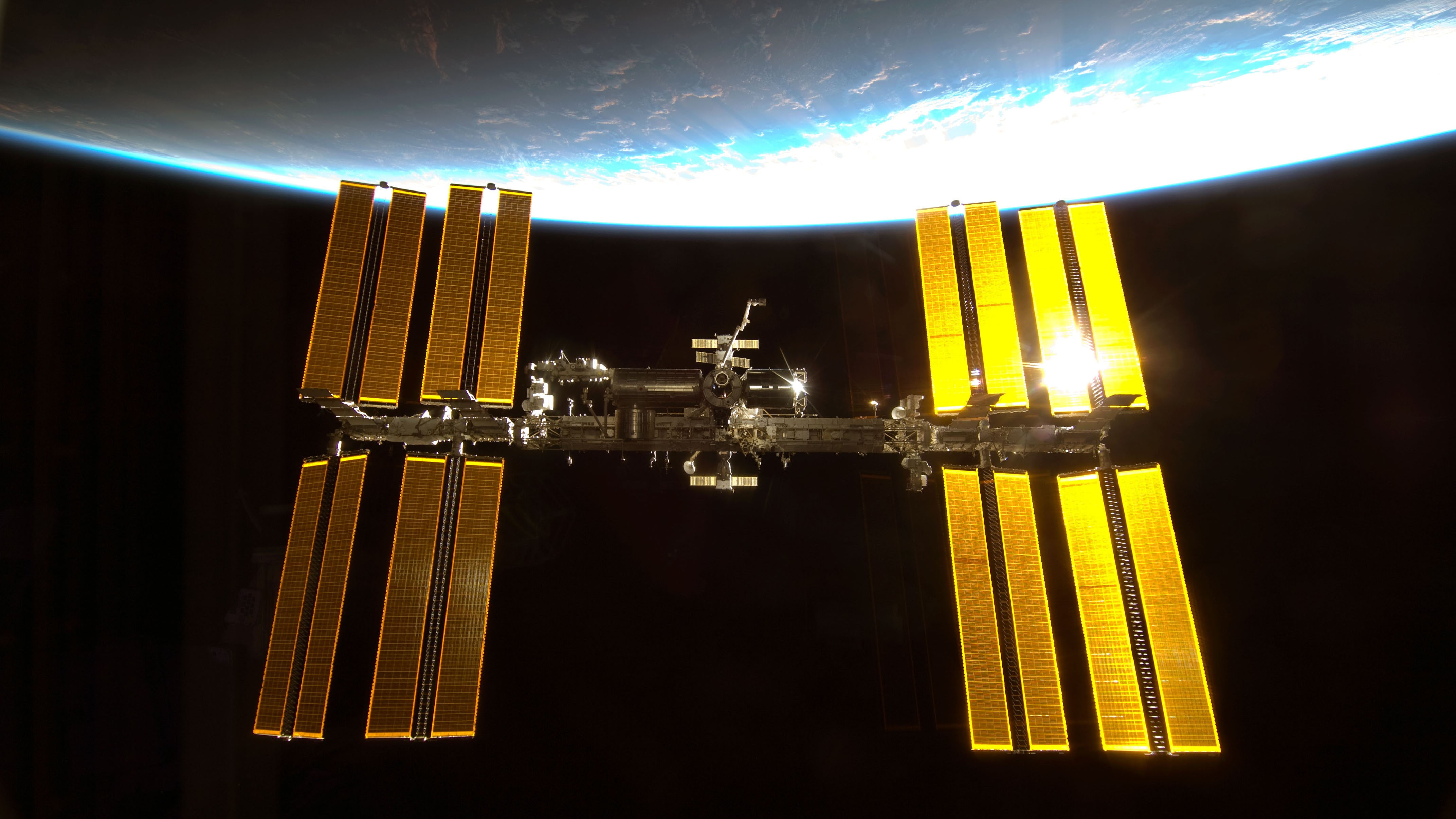 lighting equipment, space station, outdoors, 4K, black background, space, built structure, travel, building exterior, nature, city, night, travel destinations, HD Wallpaper