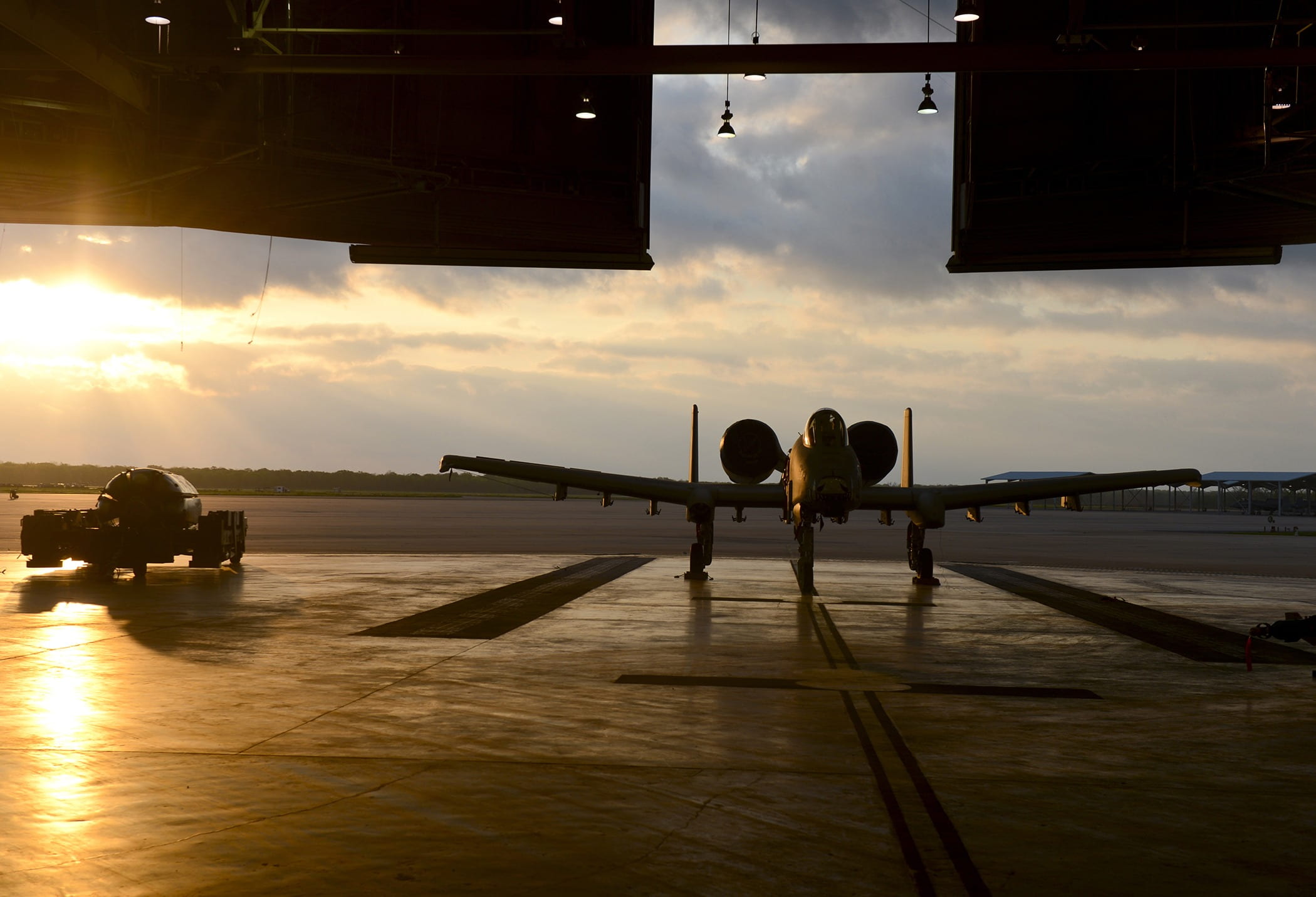 fighter, jet, hangar, airplane, 1080P, silhouette, sunset, mode of transportation, two people, women, outdoors, transportation, people, base, air vehicle, HD Wallpaper