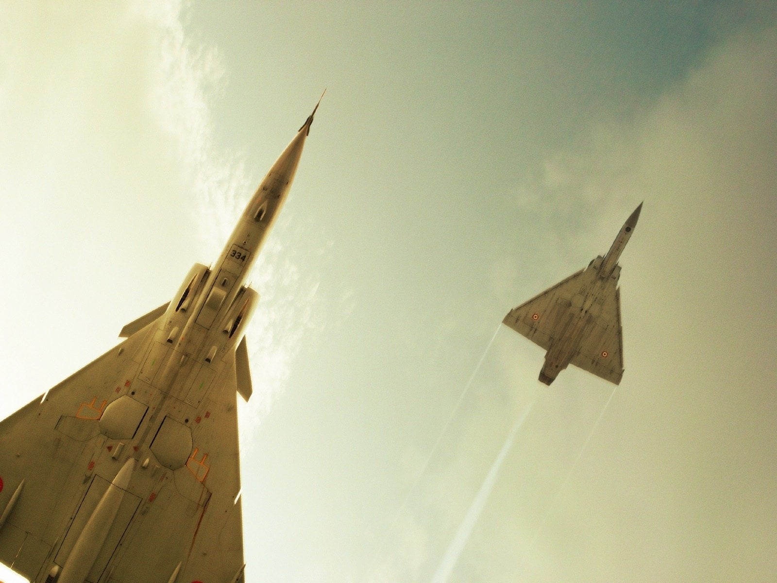 airplane, Jet Fighters, air vehicle, low angle view, plane, sailboat, day, fighter, Dassault Mirage 2000, environment, flying, no people, sky, outdoors, HD Wallpaper