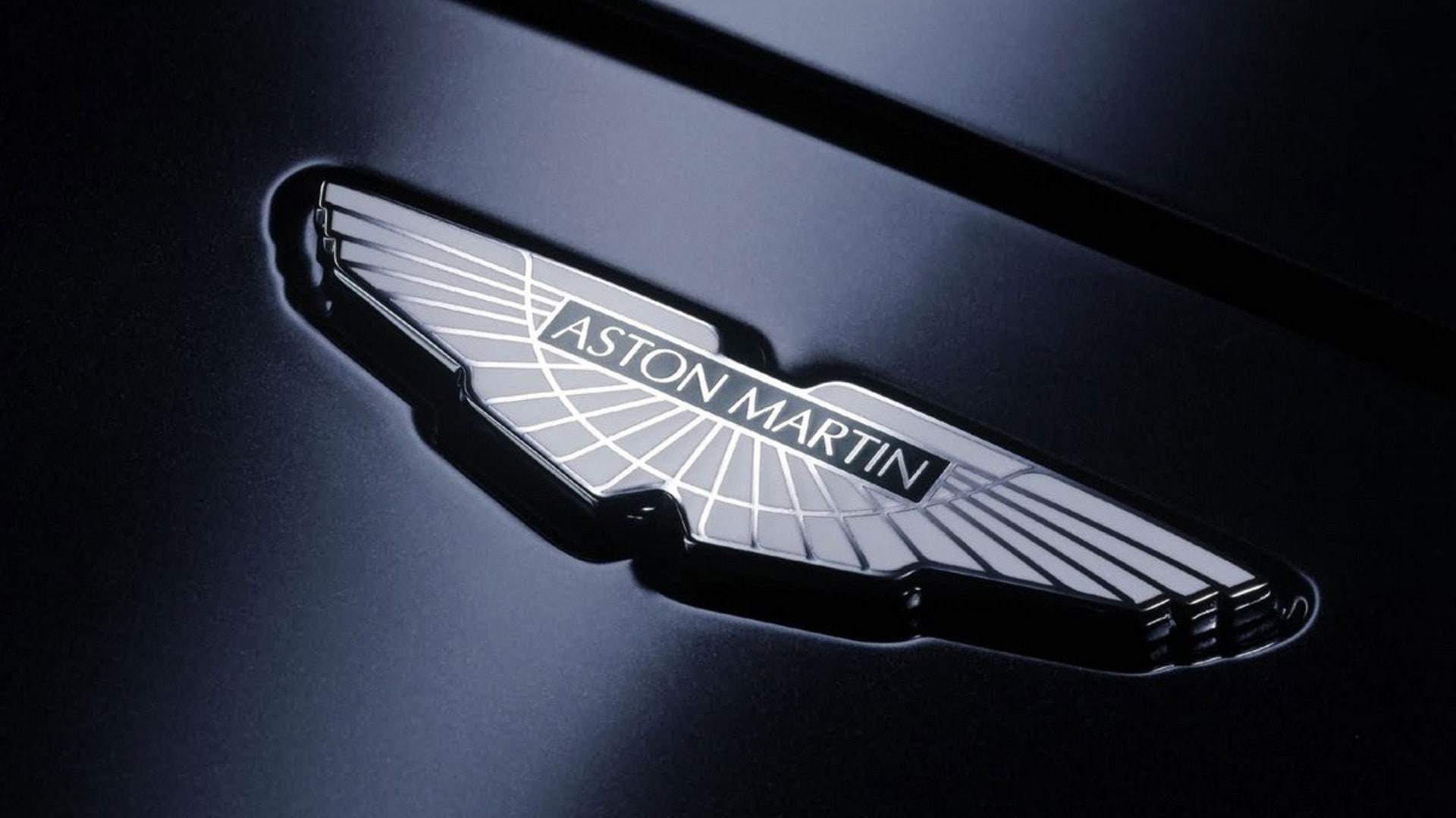 western script, indoors, 1080P, single object, Aston Martin, sign, technology, finance, retail, shopping, business, car, communication, studio shot, close-up, HD Wallpaper