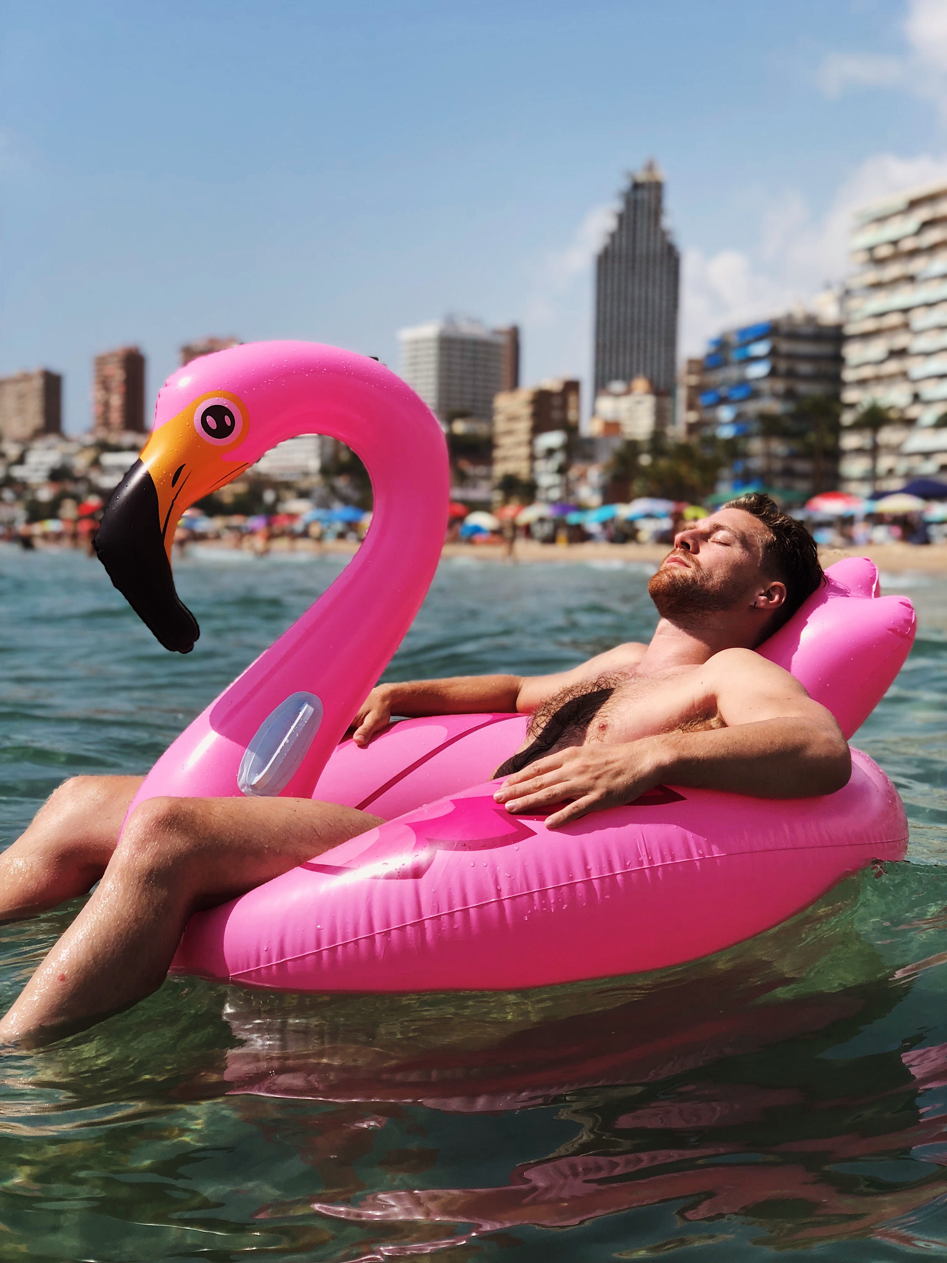 man, beach, sport, relaxation, swimwear, city, sunbathing, pink, women, spain, relaxing, summer, blowup, sea, male, fun, females, mediterranean, outdoors, Phone HD Wallpaper