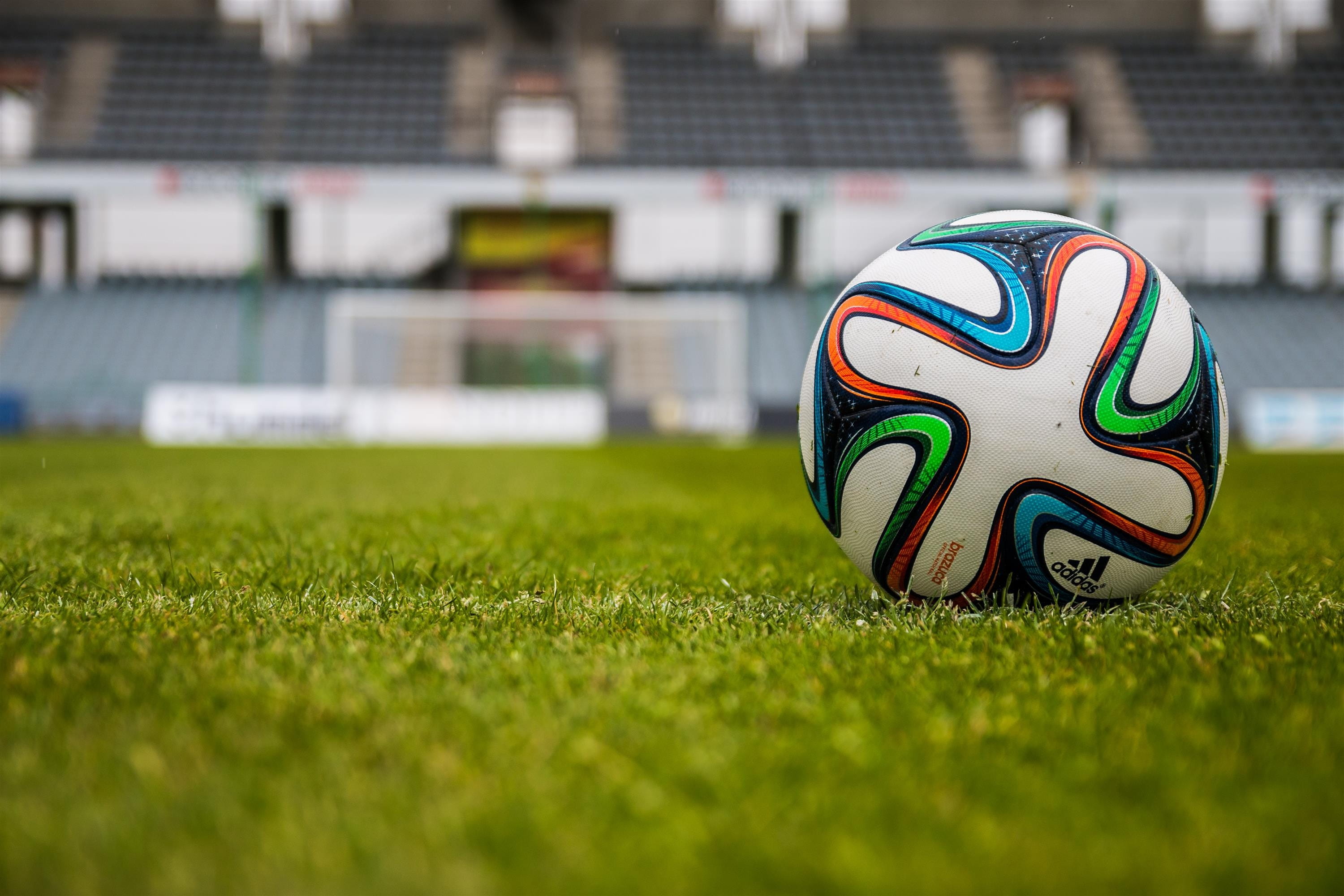 field, adidas, outdoors, nature, land, white, soccer, black, built structure, sport, green, day, blue, soccer field, stadium, team sport, no people, grass, HD Wallpaper