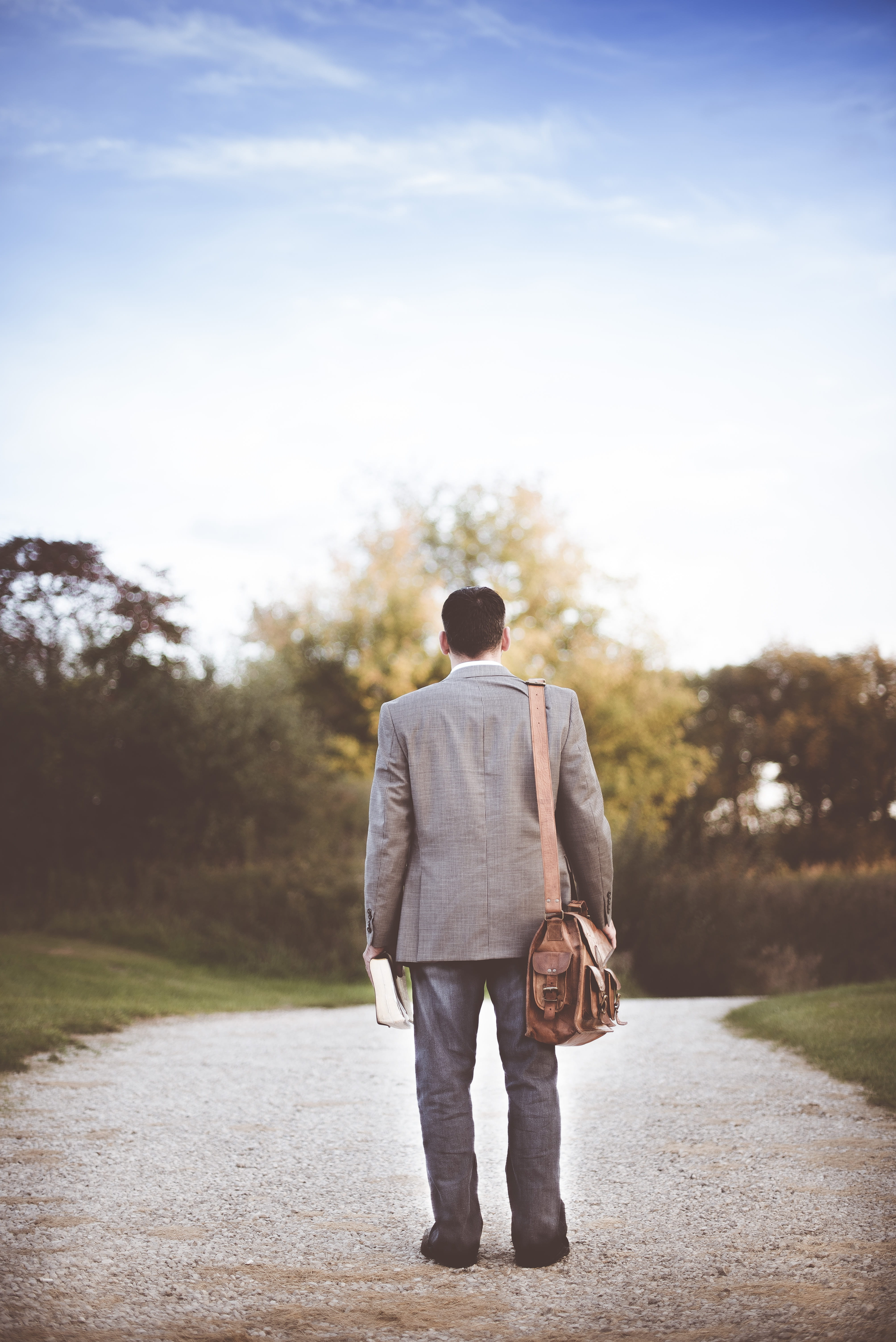 gray, going, sunlight, tree, sky, gravel, near, jacket, blue, guy, focus on foreground, grass, bag, men, real people, path, plant, male, shoulder bag, suit, Phone HD Wallpaper