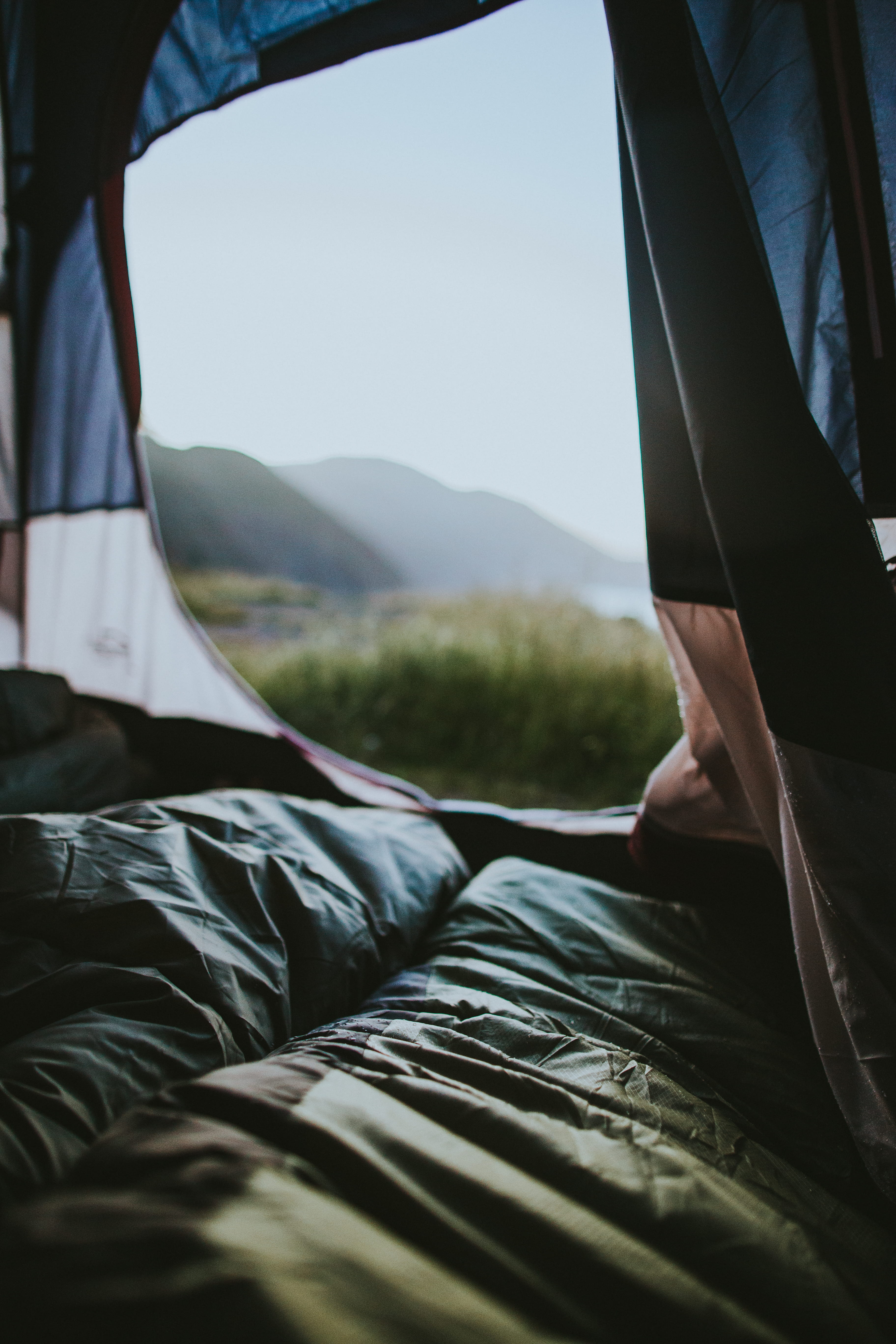 green, human hand, mountain, travel, sleeping bag, low section, sitting, day, hand, morning, 5K, body part, camping, outdoors, inside, opened, nature, Phone HD Wallpaper