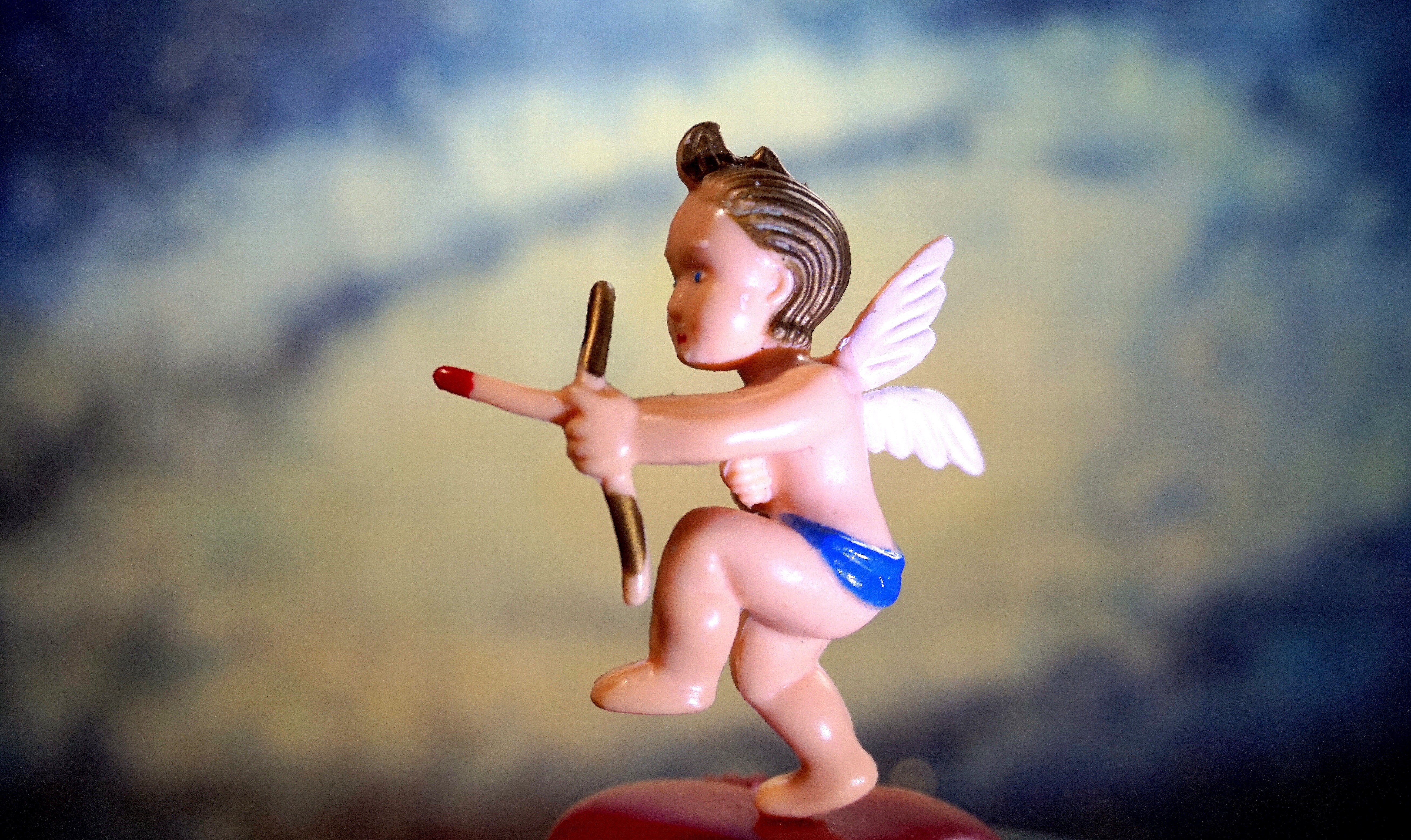 figurine, childhood, 5K, toy, human body part, valentine, representation, arc, nature, one person, focus on foreground, human representation, mythology, HD Wallpaper
