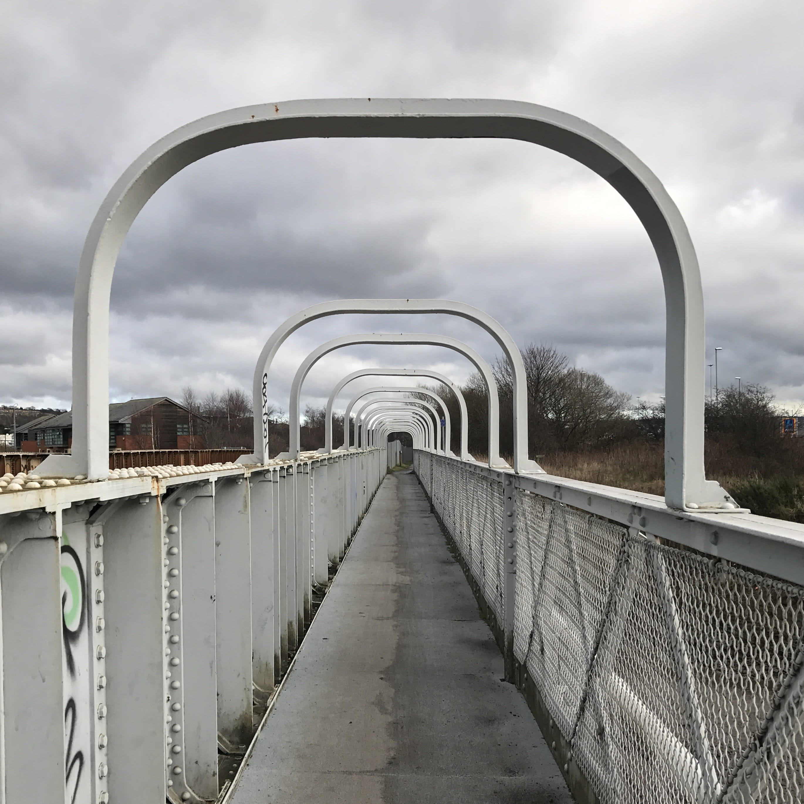 direction, bridge - man made structure, sky, graffiti, cloud - sky, cross, trees, 2K, worn, cloudy, footbridge, day, concrete, the way forward, cloud, Phone HD Wallpaper