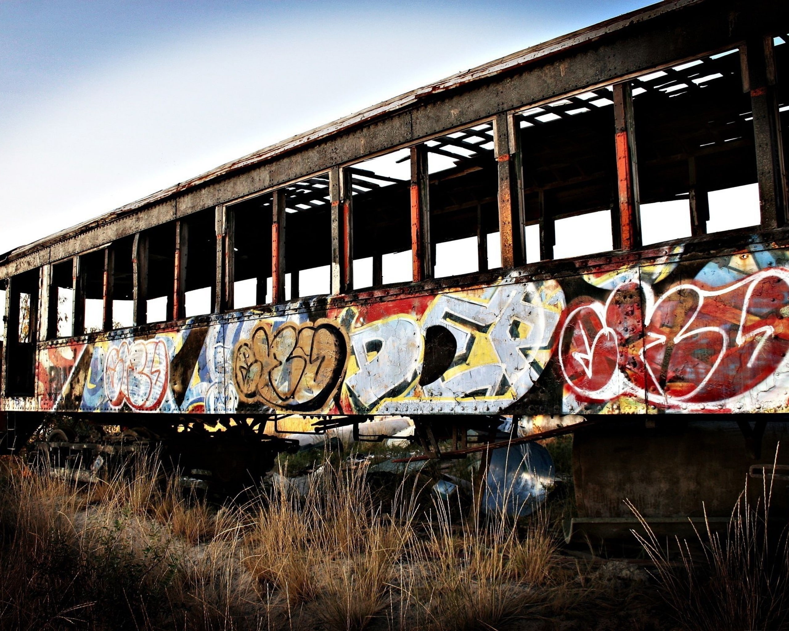 train - vehicle, built structure, abandoned, text, rail transportation, freight train, railroad track, day, track, grass, graffiti, no people, outdoors, HD Wallpaper