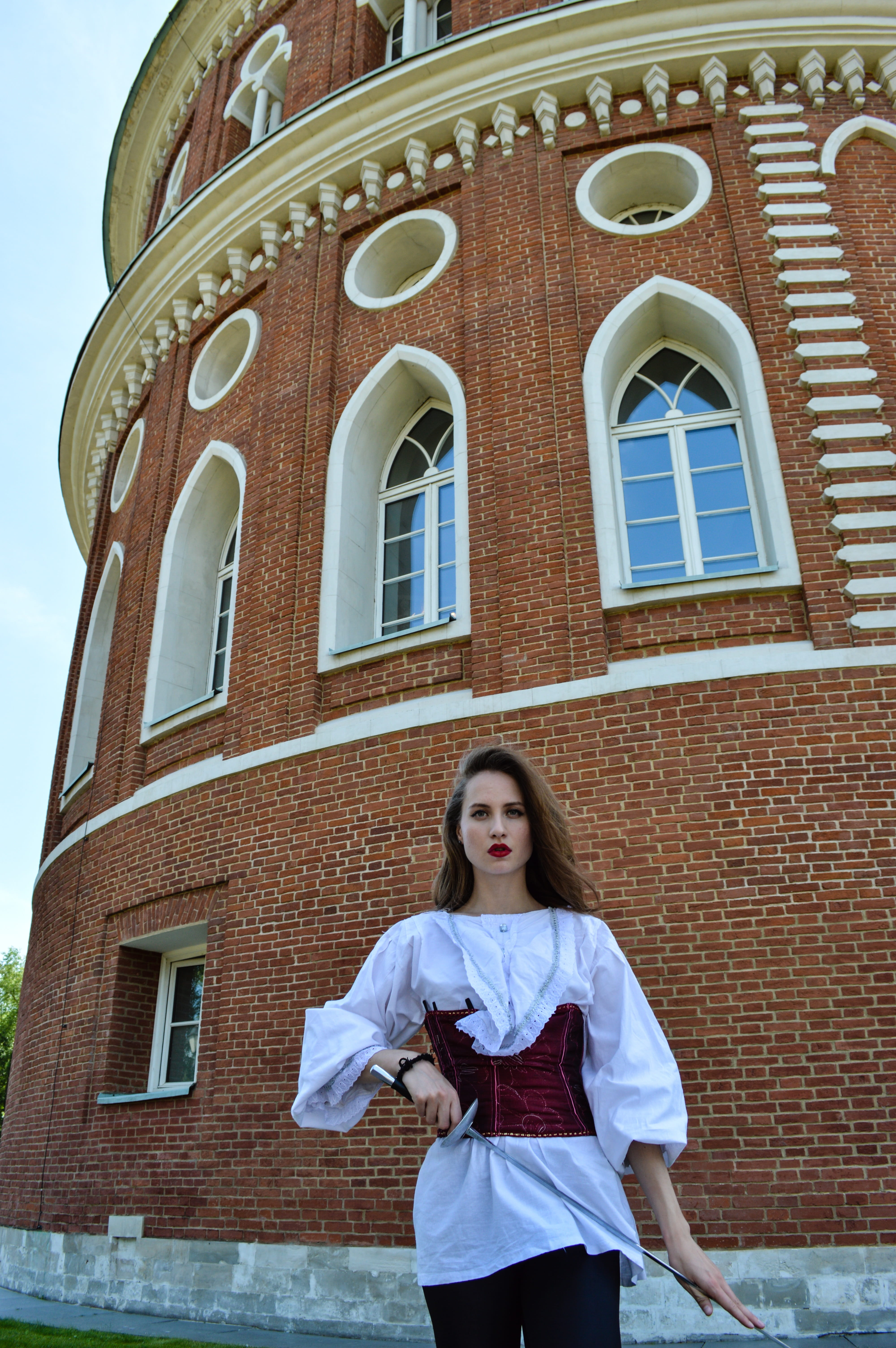 beautiful woman, leisure activity, historical, musketeer, sword, palace, front view, young women, 16 21, lifestyles, brick, actress, women, history, building, Phone HD Wallpaper