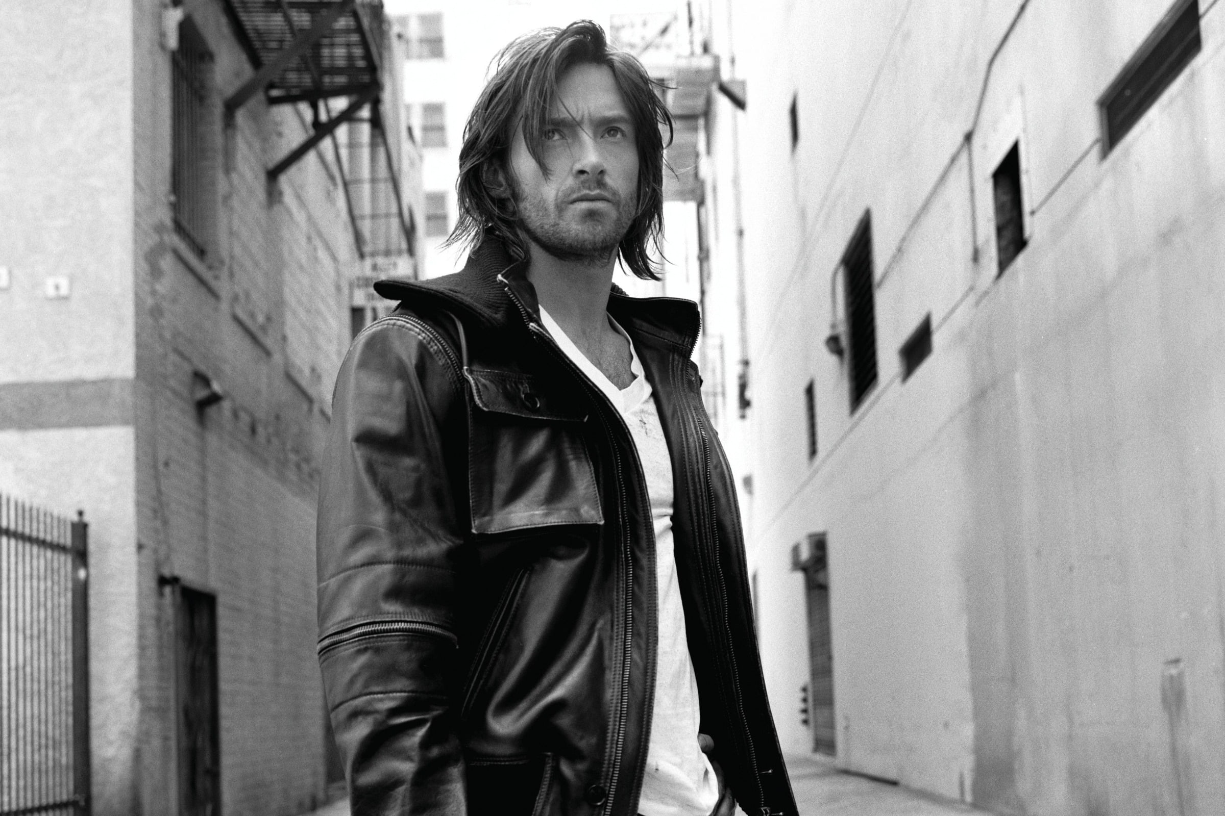 black and white photo, Hugh Jackman, built structure, jacket, casual clothing, 1080P, waist up, hair, s, look, architecture, leisure activity, one person, HD Wallpaper