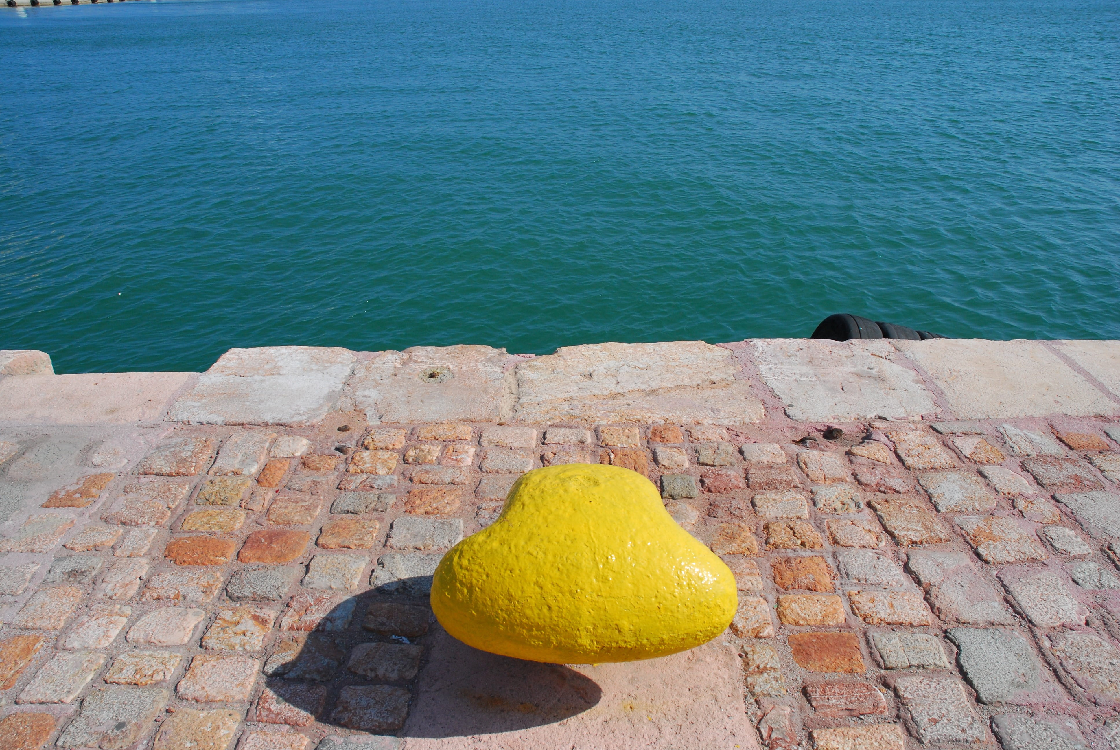 water, beauty in nature, chios, boat hook, nature, yellow, anchor spot, outdoors, footpath, day, beach, blue, rock - object, no people, high angle view, HD Wallpaper