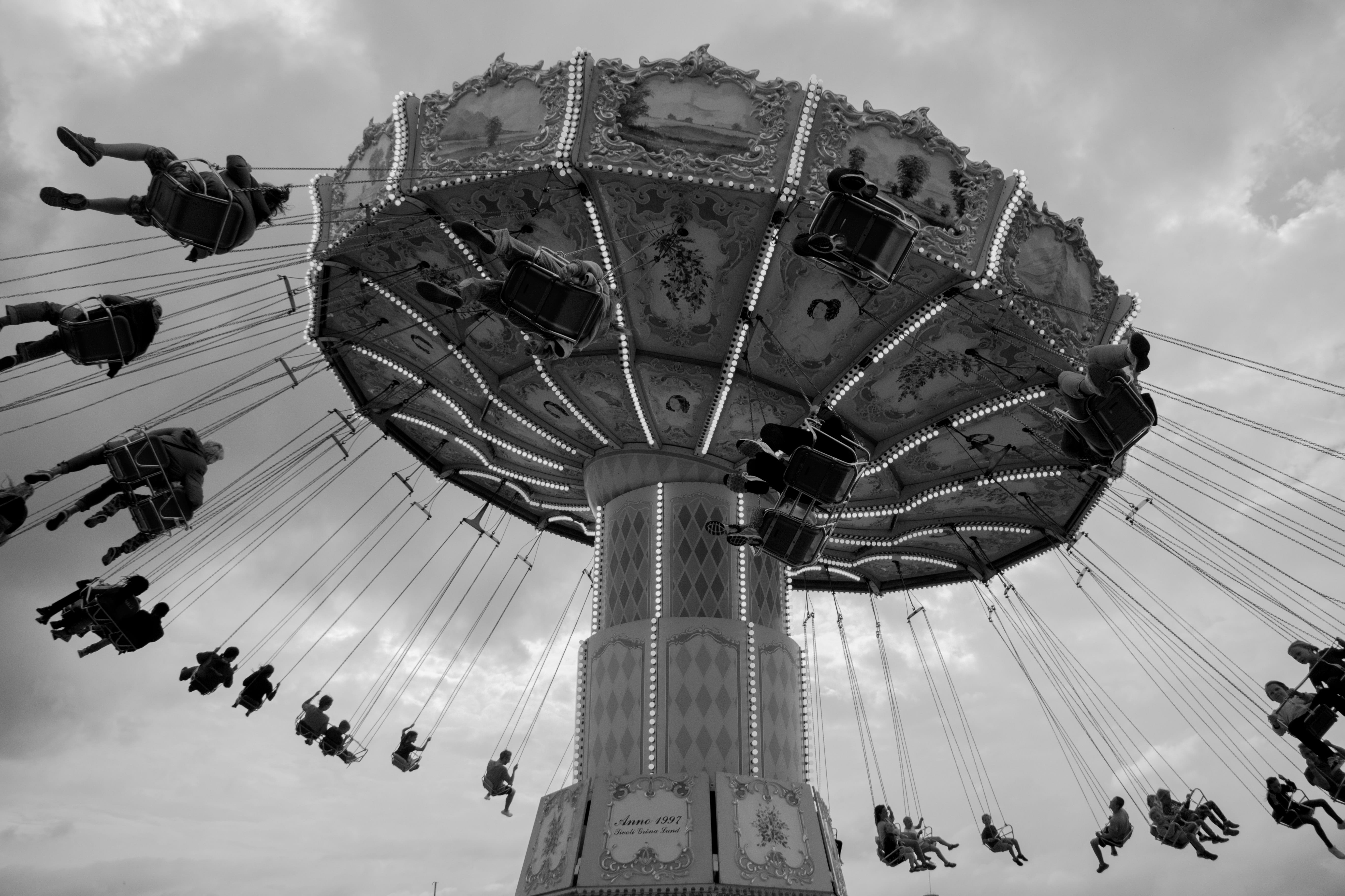 leisure activity, women, outdoors, large group of people, black and white, swing carousel, s, sky, riding, park, arts culture and entertainment, 5K, amusement park, HD Wallpaper