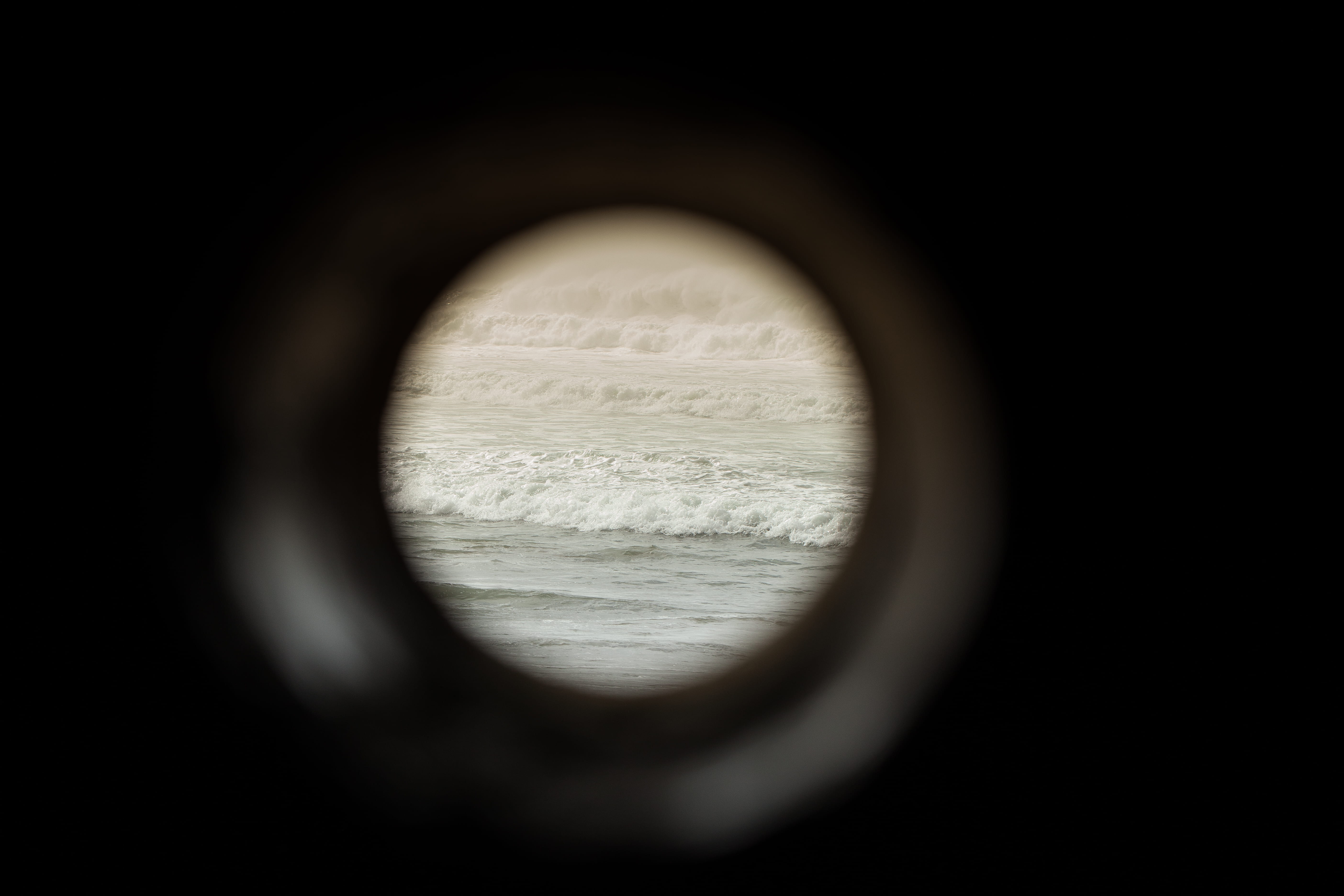 pipe, geometric shape, ocean view, sea, black color, peep hole, beauty in nature, hole, port hole, water, nature, peek, mystery, ocean, indoors, 5K, across, HD Wallpaper