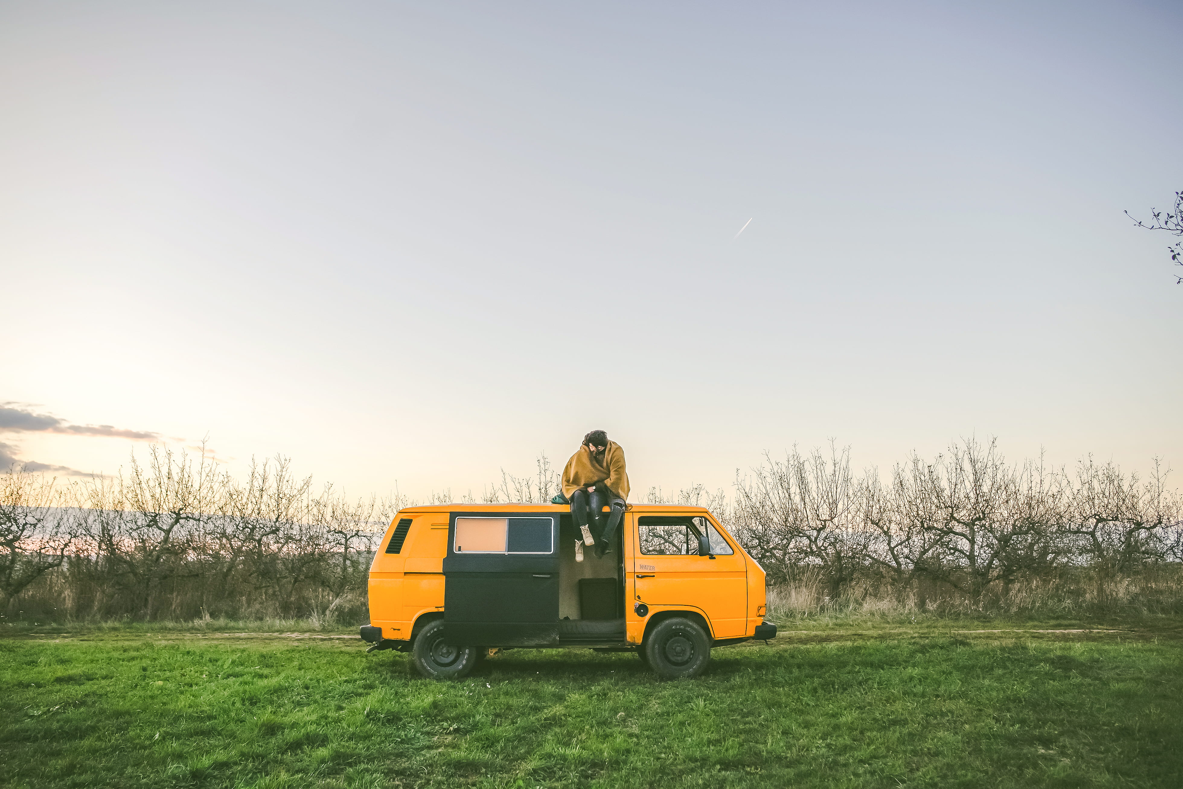 land vehicle, male, adult, sky, nature, sitting, yellow, man, clear sky, couple - relationship, land, van, transportation, two people, plant, car, campervan, HD Wallpaper