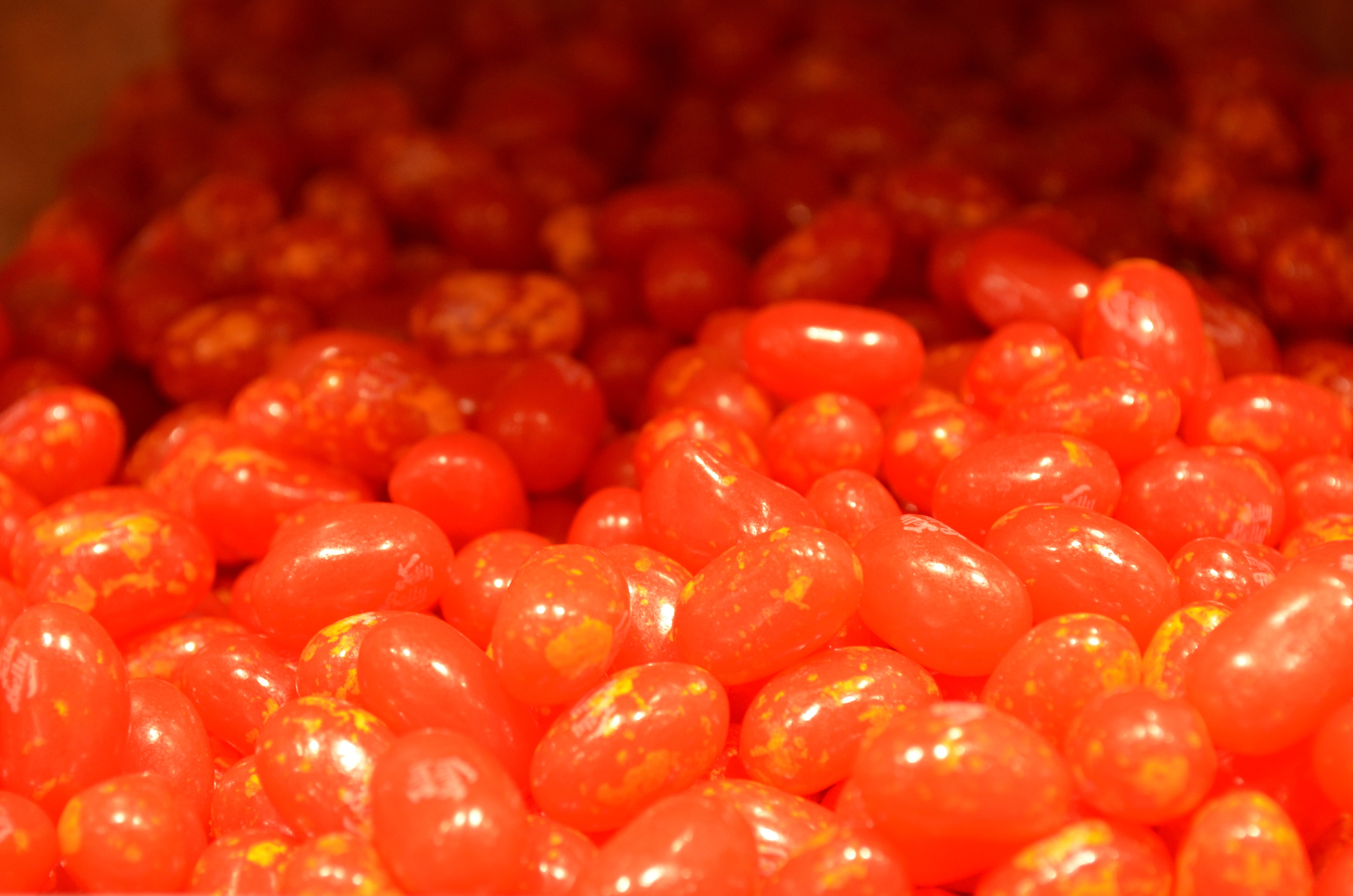 backgrounds, 4K, speckled, jelly beans, selective focus, vegetable, tomato, orange, fruit, large group of objects, healthy eating, freshness, retail, wellbeing, HD Wallpaper