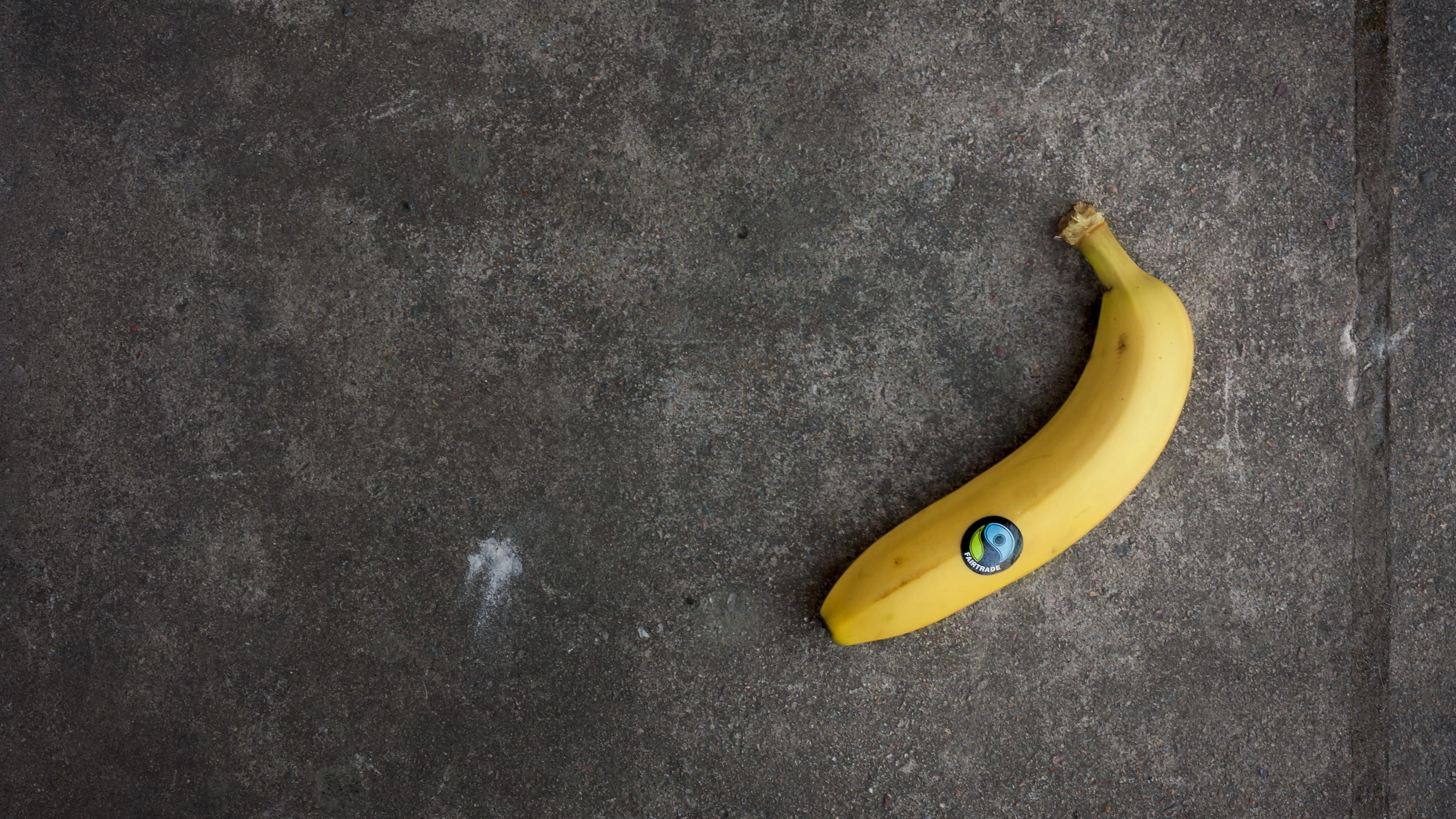 wall - building feature, concrete, single object, directly above, fruit, justice, banana, policy, still life, food and drink, asphalt, outdoors, gray, marking requirements, HD Wallpaper