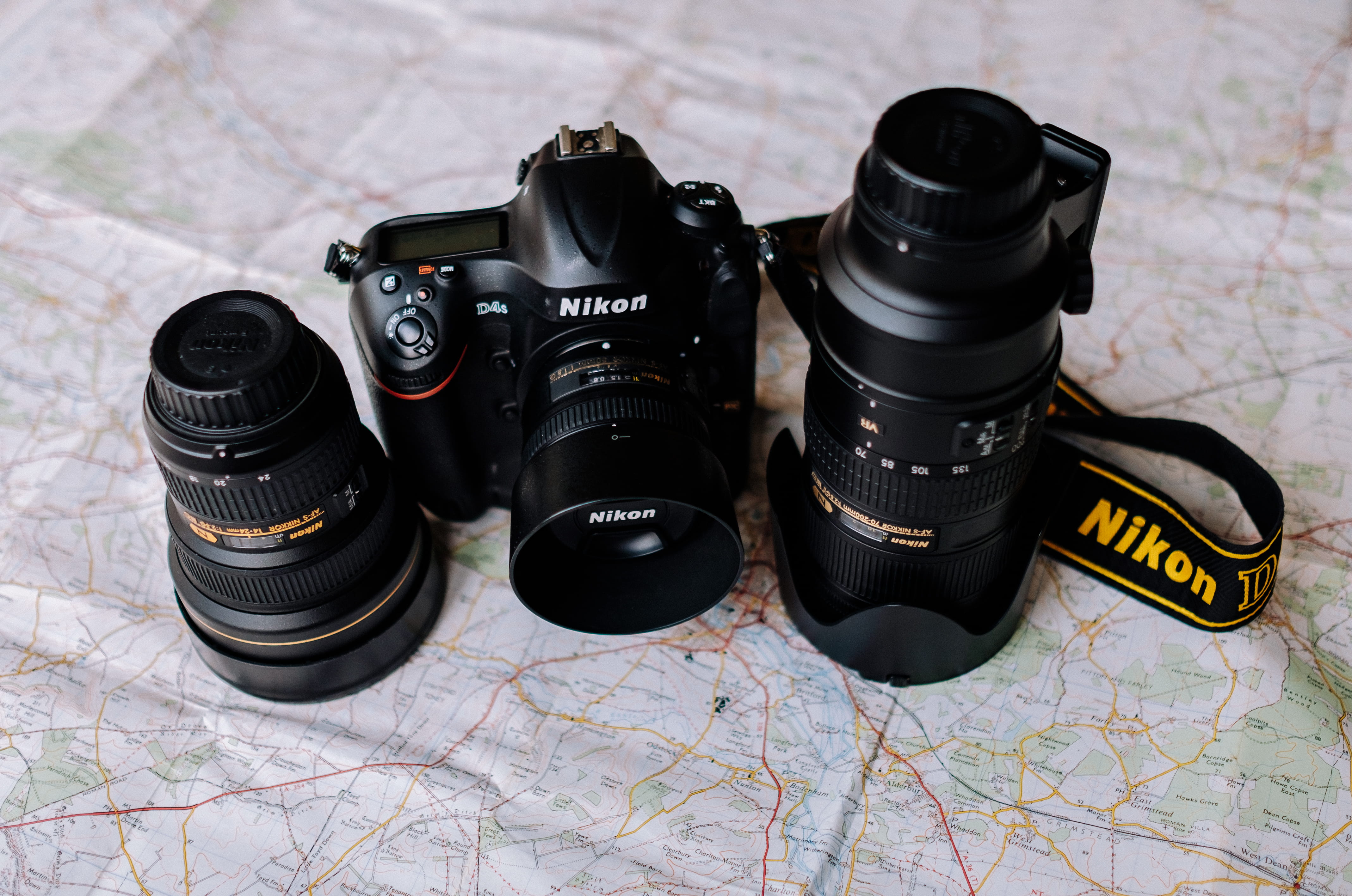camera - Photographic Equipment, cmeras, dslr, photograph, map, photographic Equipment, navigational compass, indoors, camera, lens, equipment, focus on foreground, HD Wallpaper