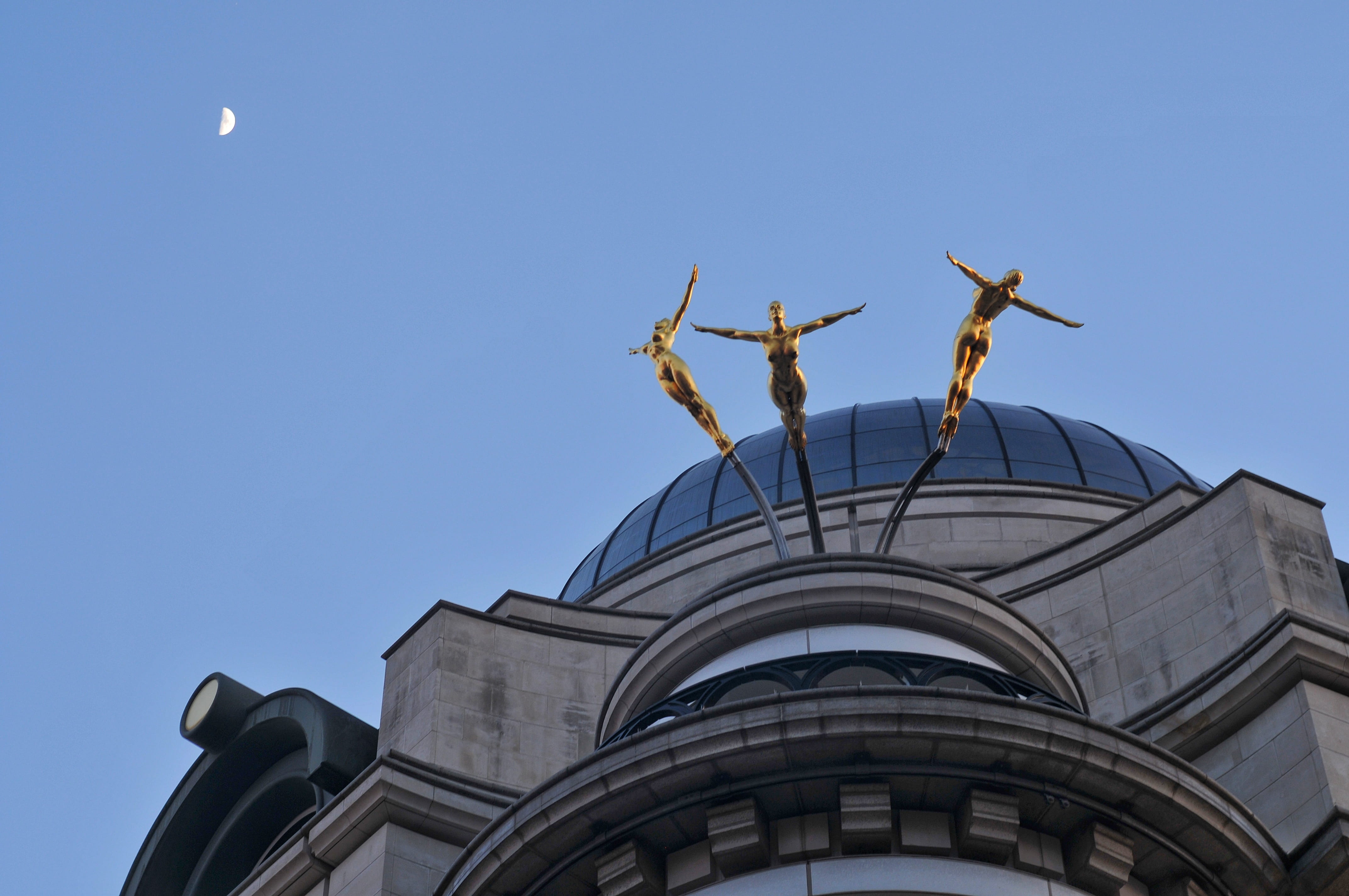 blue, building, clear sky, united kingdom, art and craft, low angle view, three gold swimmers, copy space, architecture, outdoors, building exterior, travel destinations, HD Wallpaper