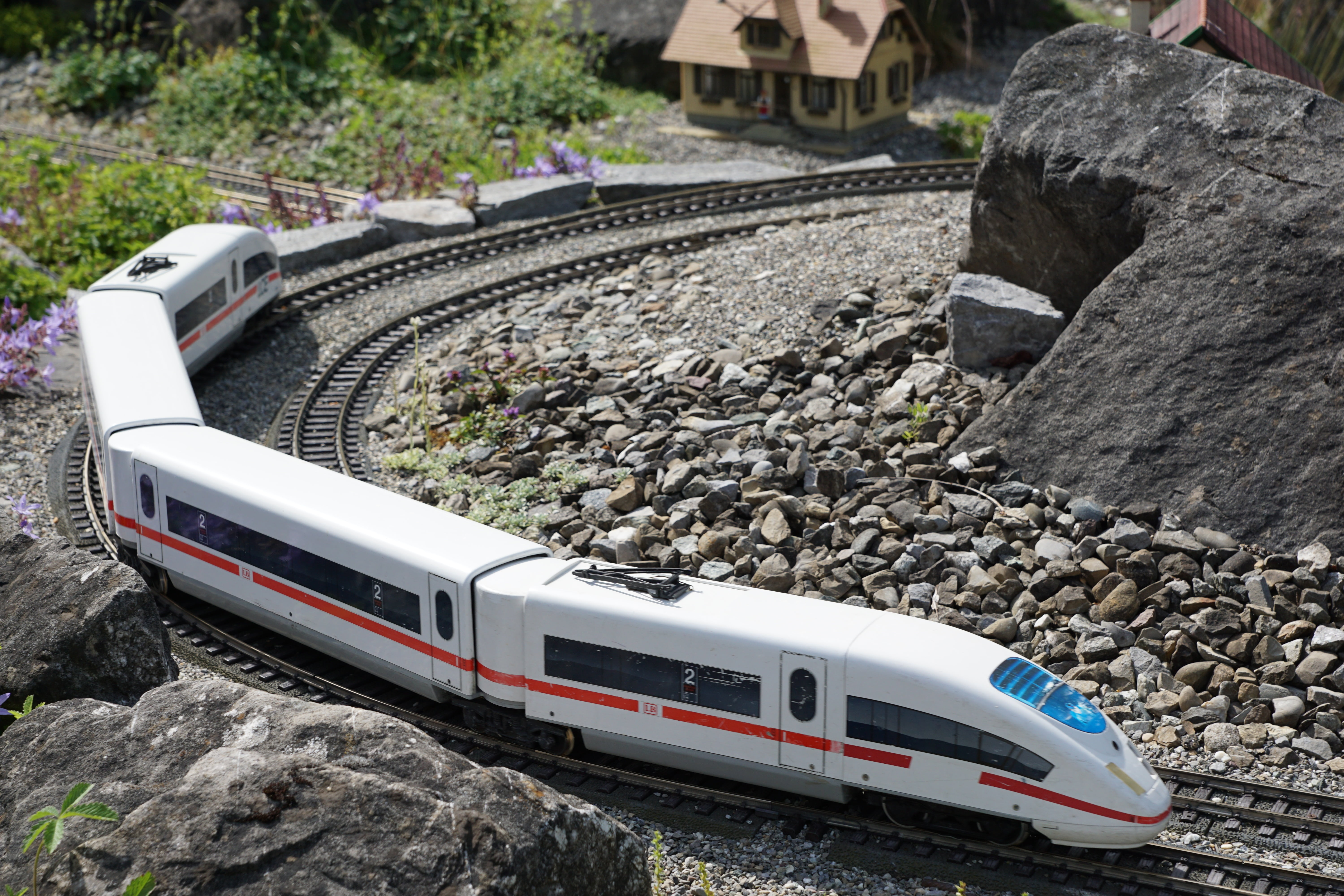 solid, public transportation, rock, motor vehicle, land, 5K, train, track, rock - object, lake constance, outdoors, land vehicle, seemed, miniature, stones, HD Wallpaper