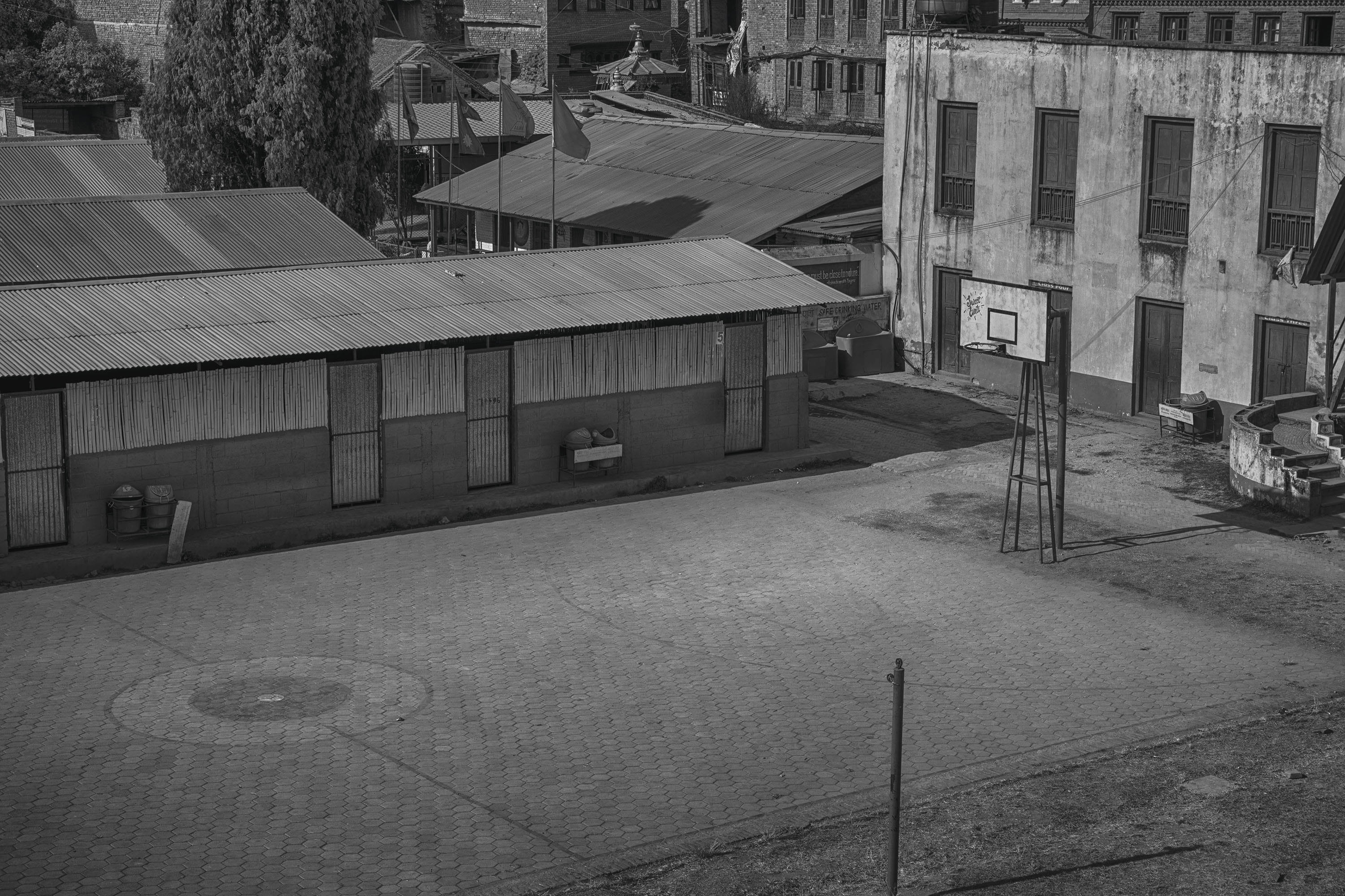 school in bhaktapur, bhaktapur, blacknwhite, concrete, stark, kathmandu, nepal, nature, residential district, city, barrier, day, sunlight, street, high angle view, HD Wallpaper