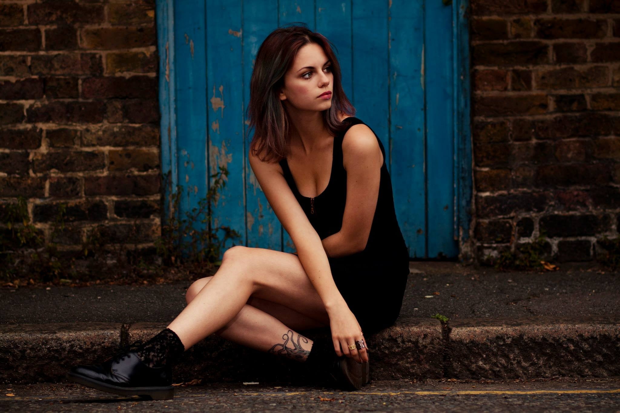 outdoors, black, blue, sleeveless, brick, beauty, young women, brick wall, 1080P, women, pierced lip, piercing, clothing, s, fashion, auburn hair, beautiful woman, HD Wallpaper
