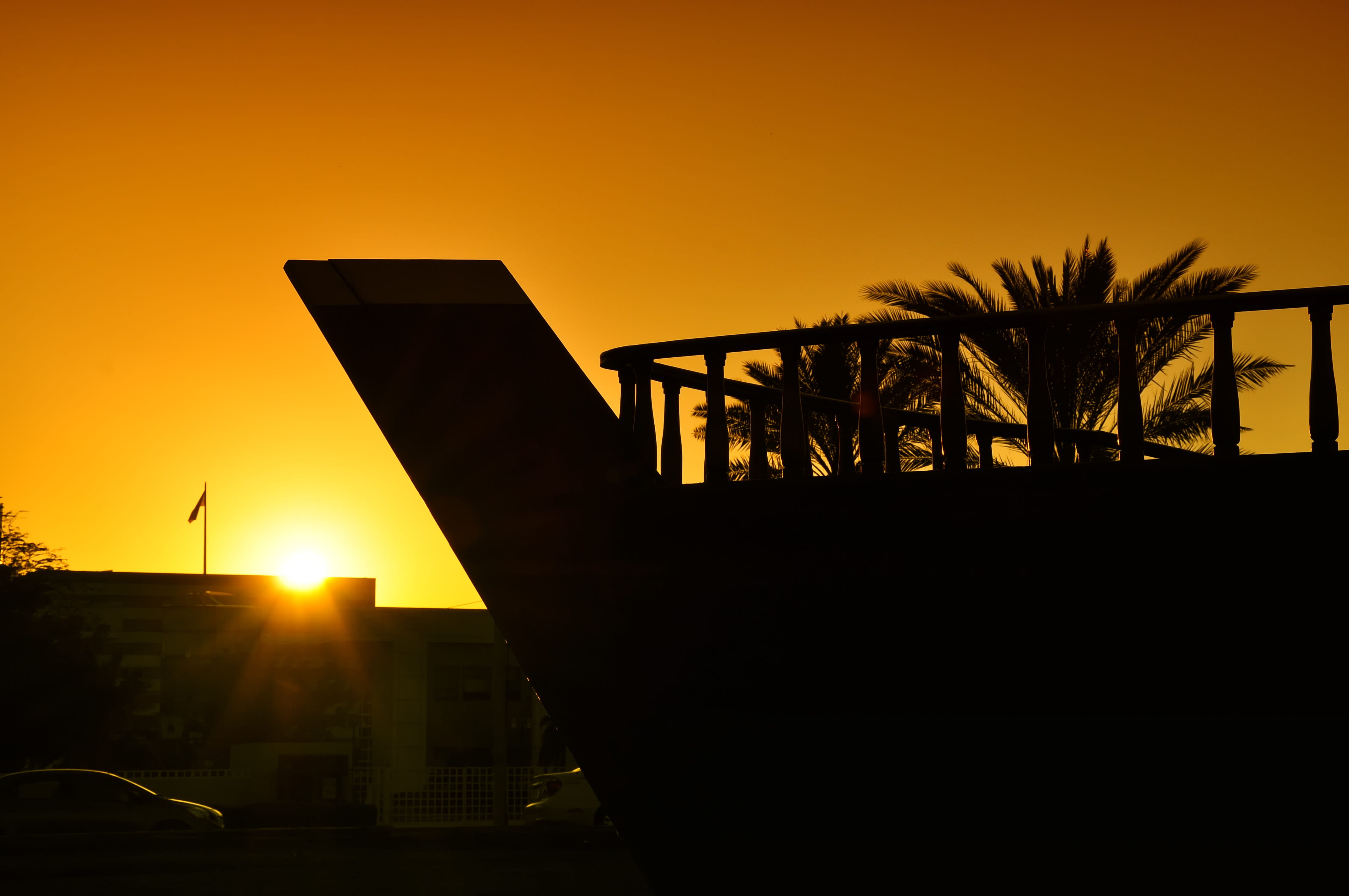 george paris, silhouette, plant, saudi arabia, yellow, sunlight, copy space, outdoors, architecture, corniche, built structure, 4K, orange, jeddah, tree, HD Wallpaper