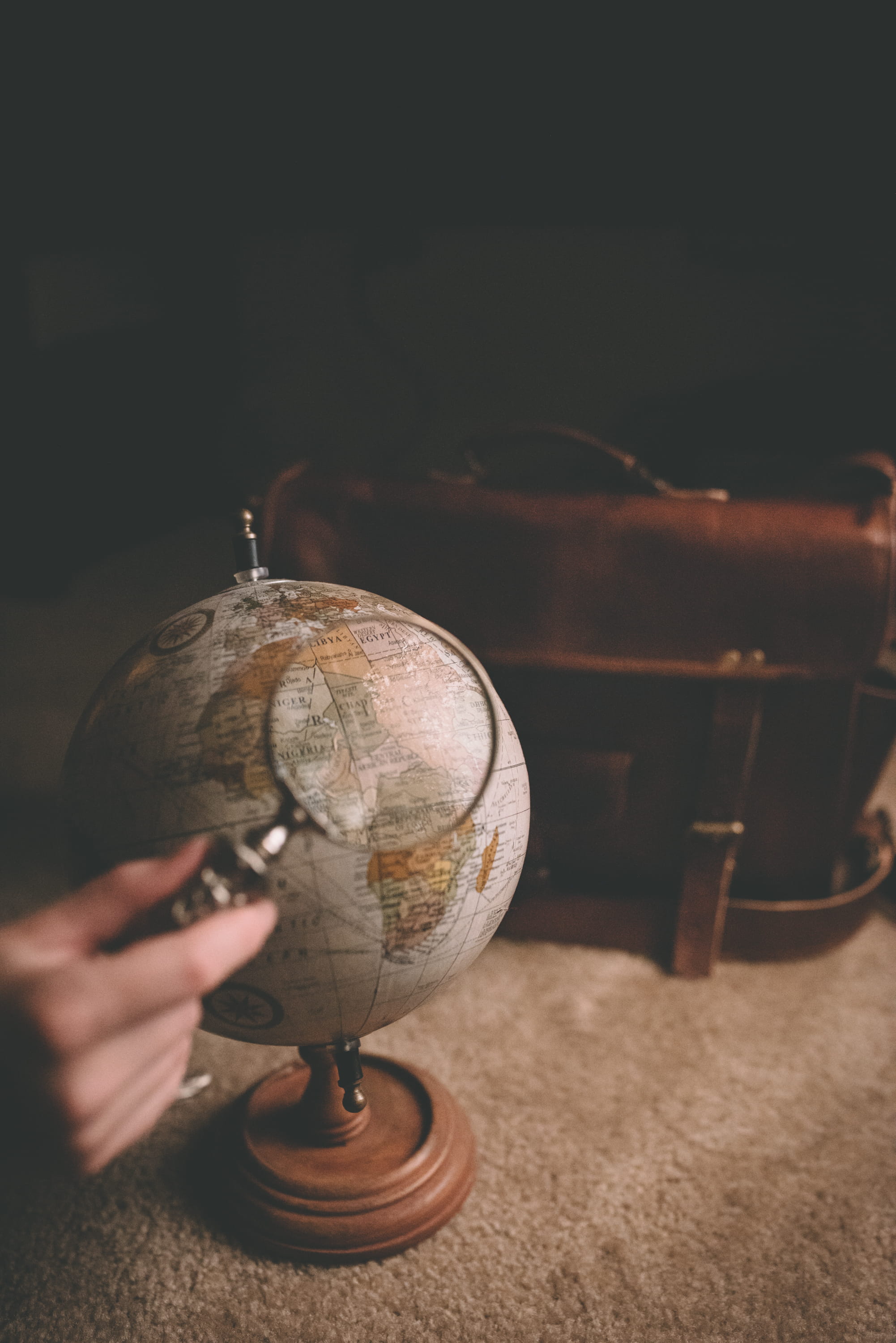 indoors, holding, adventure, one person, retro Styled, desk, magnifying glass, using, next, lifestyles, antique, blue, old-fashioned, human body part, magnifying, Phone HD Wallpaper
