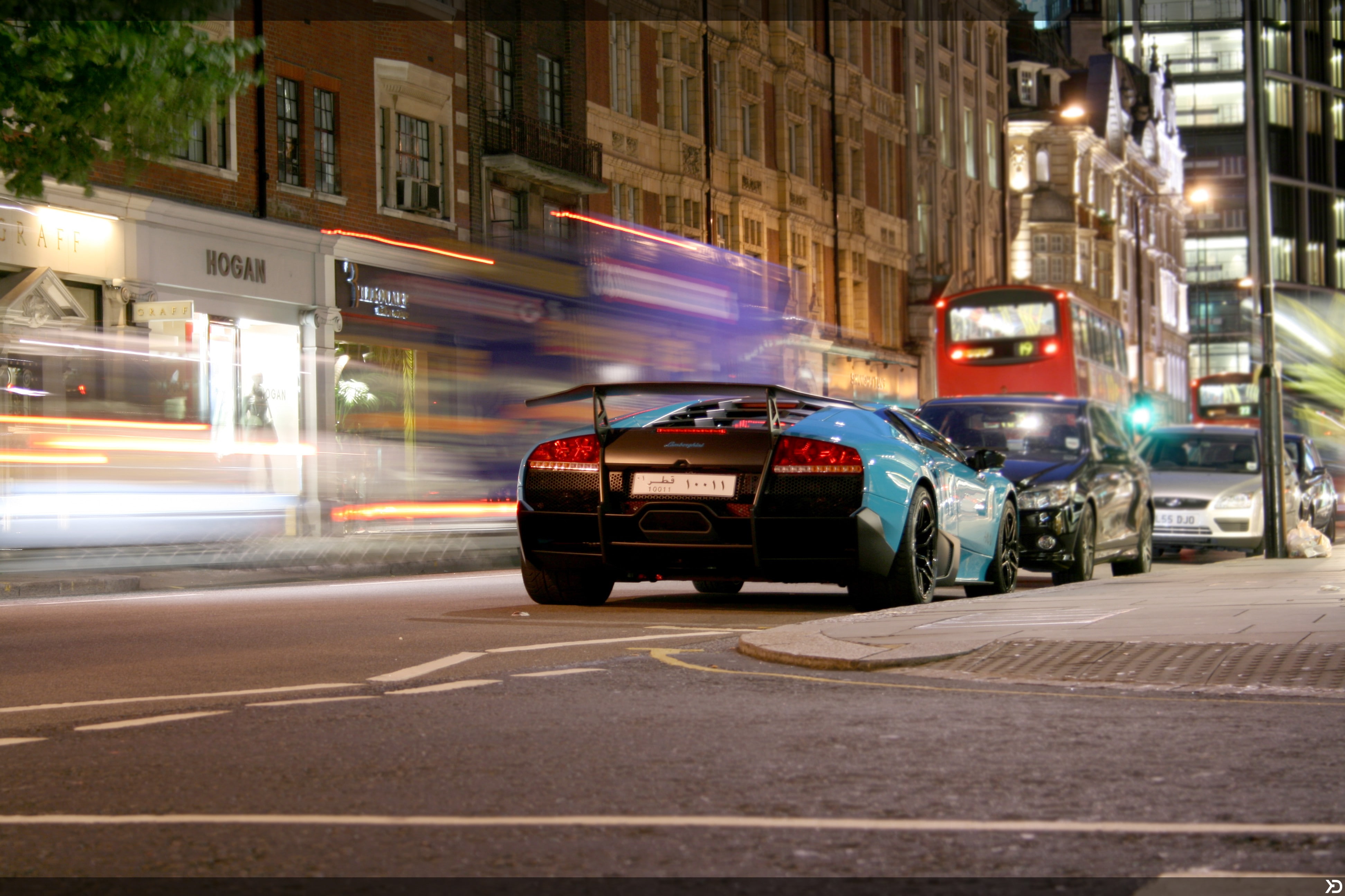Lamborghini Murcielago, motion, mode of transportation, city, land vehicle, illuminated, road, city life, blurred motion, on the move, city street, built structure, HD Wallpaper