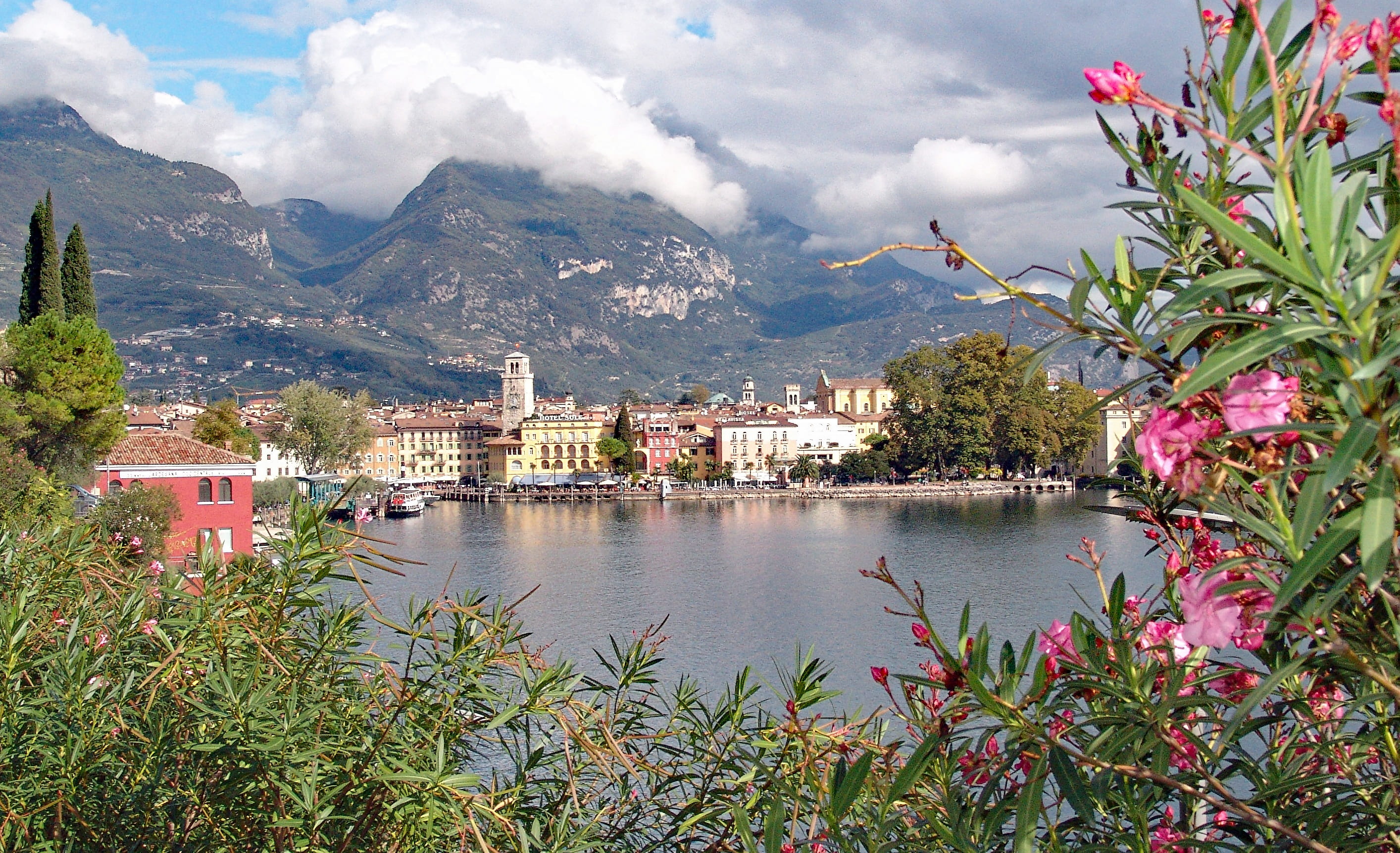 Lake, mountain range, switzerland, building, travel destinations, lake Maggiore, outdoors, built structure, europe, beauty in nature, city view, cloud - sky, HD Wallpaper