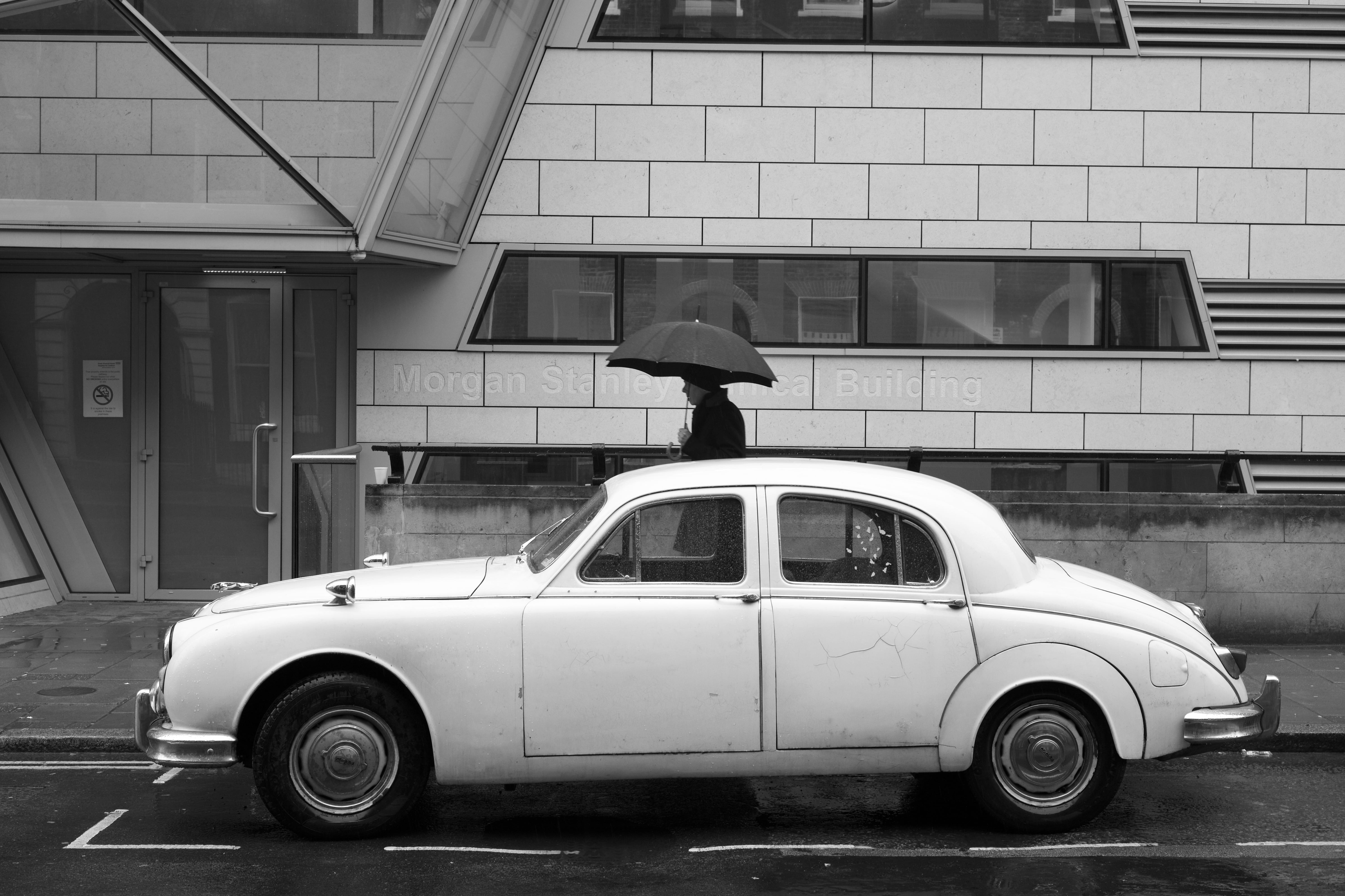 vintage, outdoors, classic car, street, wet, protection, parked car, stationary, holding, rain, transportation, black and white, motor vehicle, man, white, HD Wallpaper