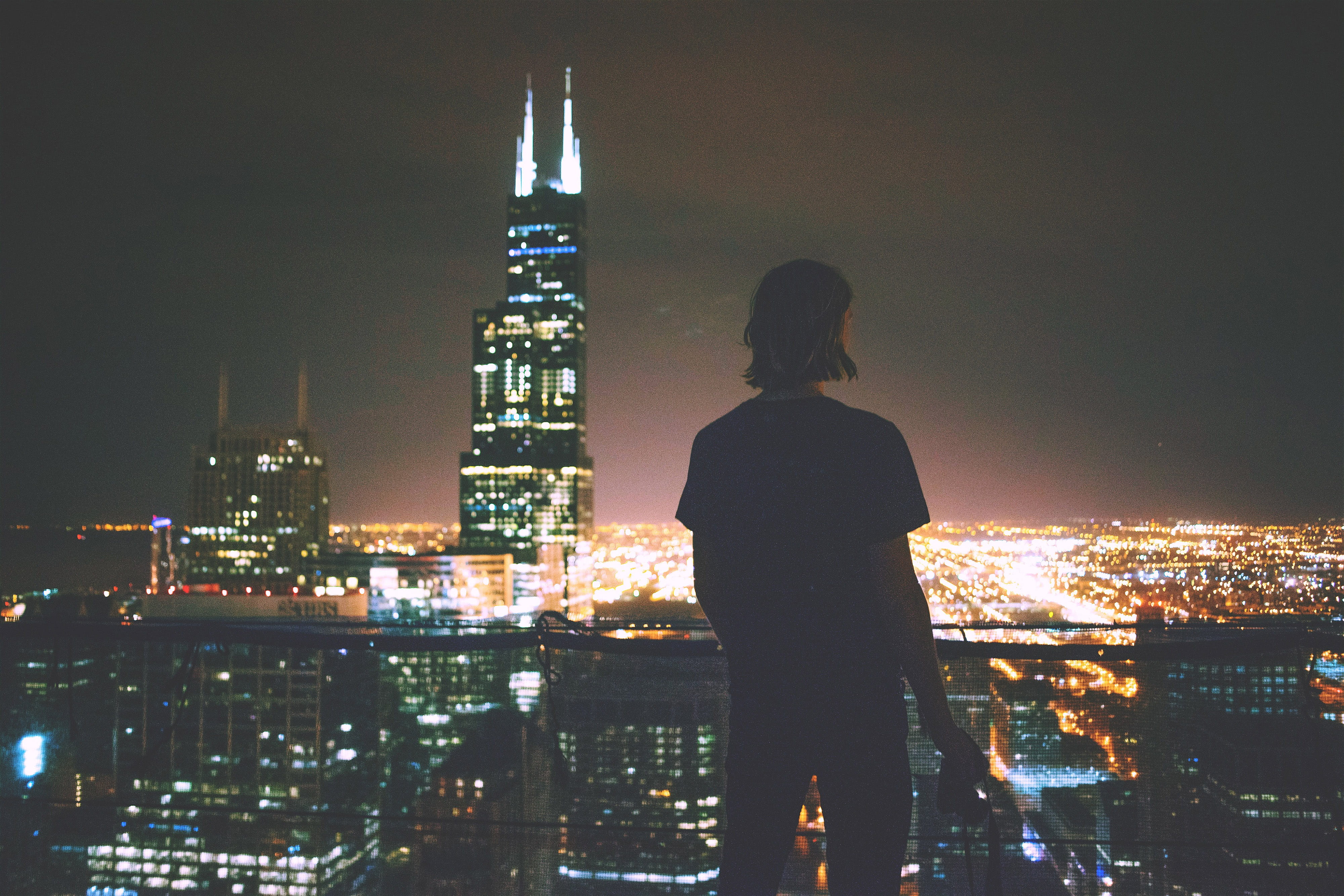 cityscape, city, looking at view, at night, building, night, man, architecture, one person, office building exterior, view, modern, built Structure, people, HD Wallpaper