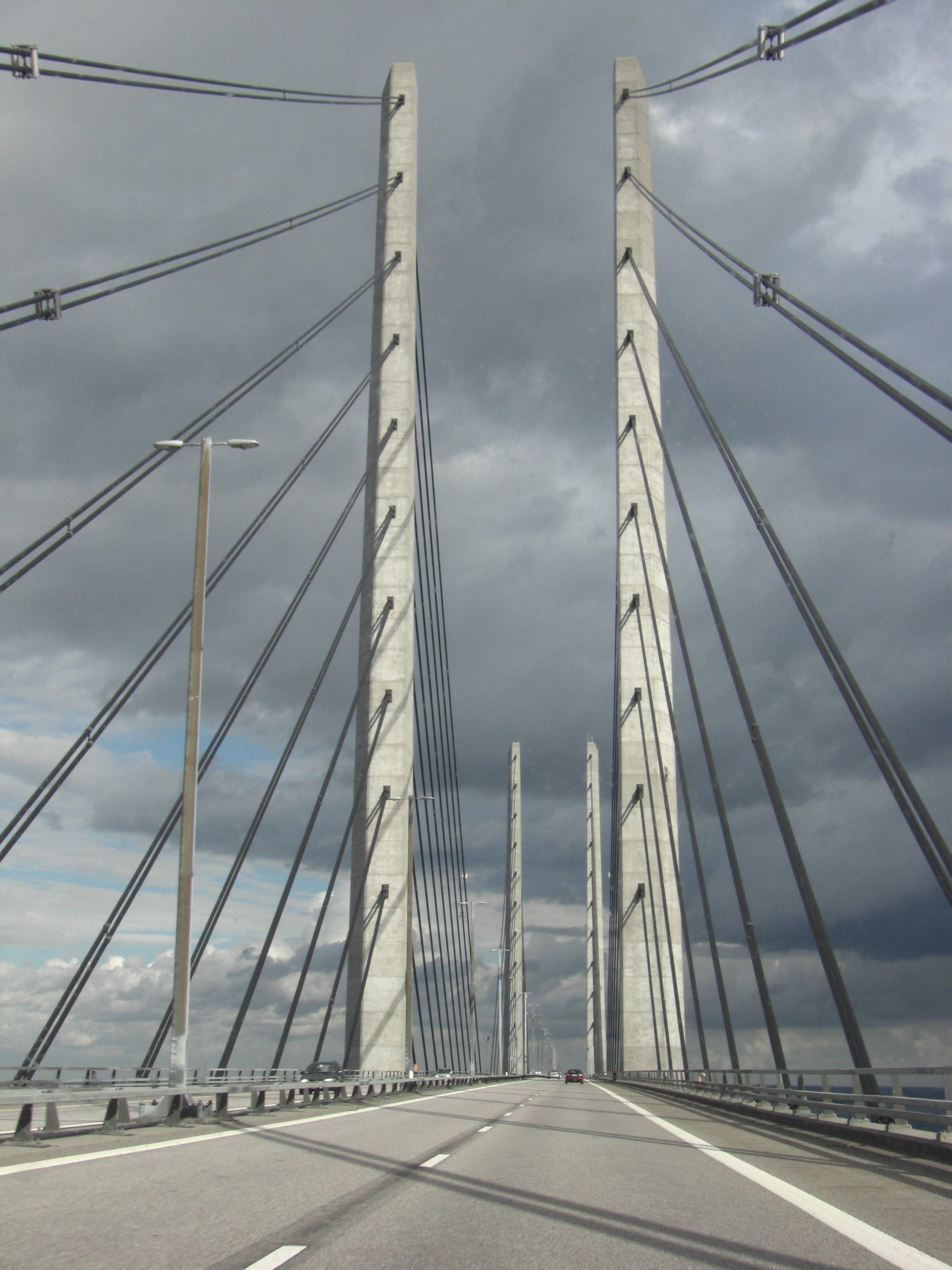 architecture, suspension bridge, sky, bridge - man made structure, direction, bridge, oresund bridge, cable-stayed bridge, cable, mode of transportation, Phone HD Wallpaper